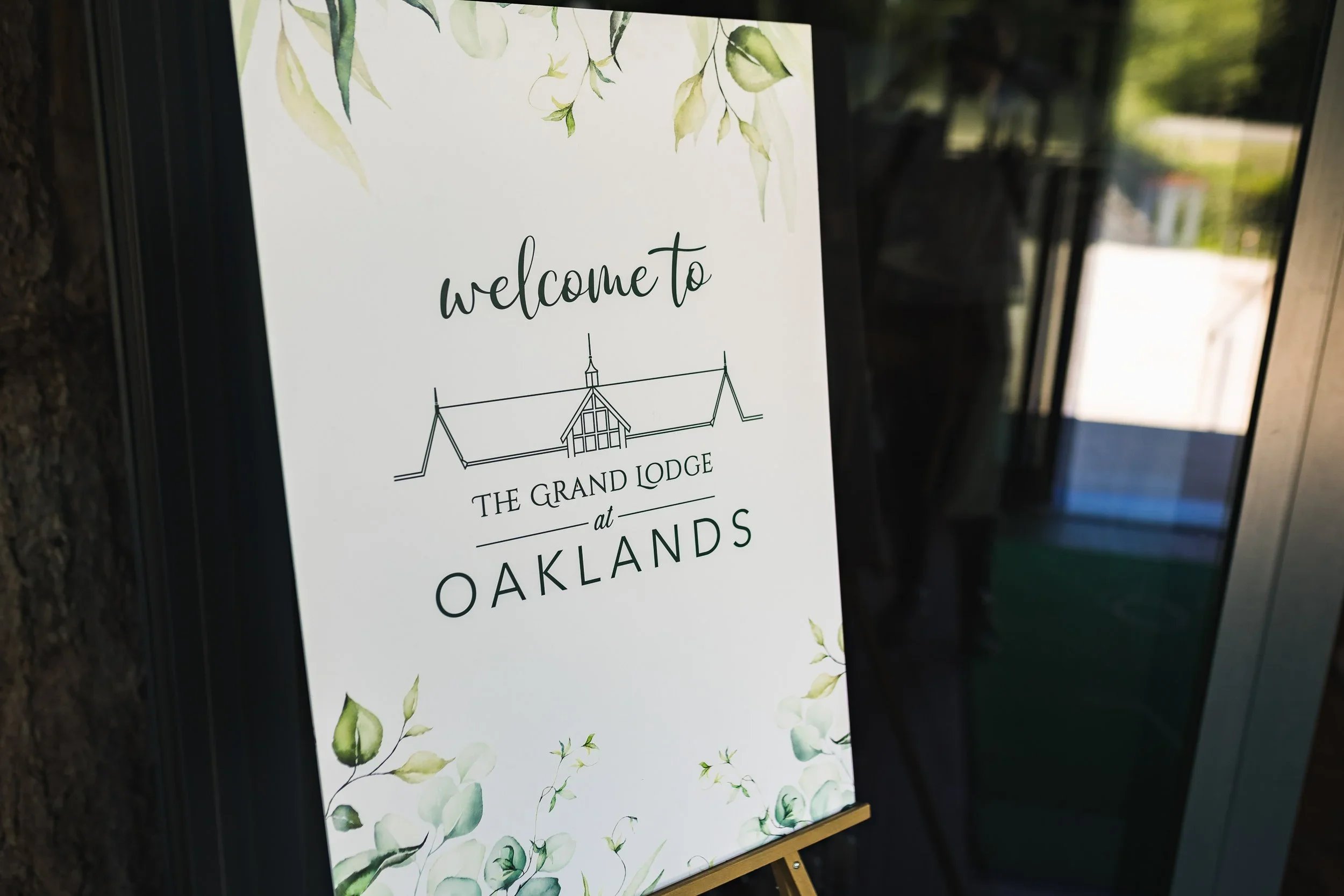 Welcome sign for Lewis and Guy’s wedding at Oaklands Grand Lodge wedding venue in Driffield, East Yorkshire.