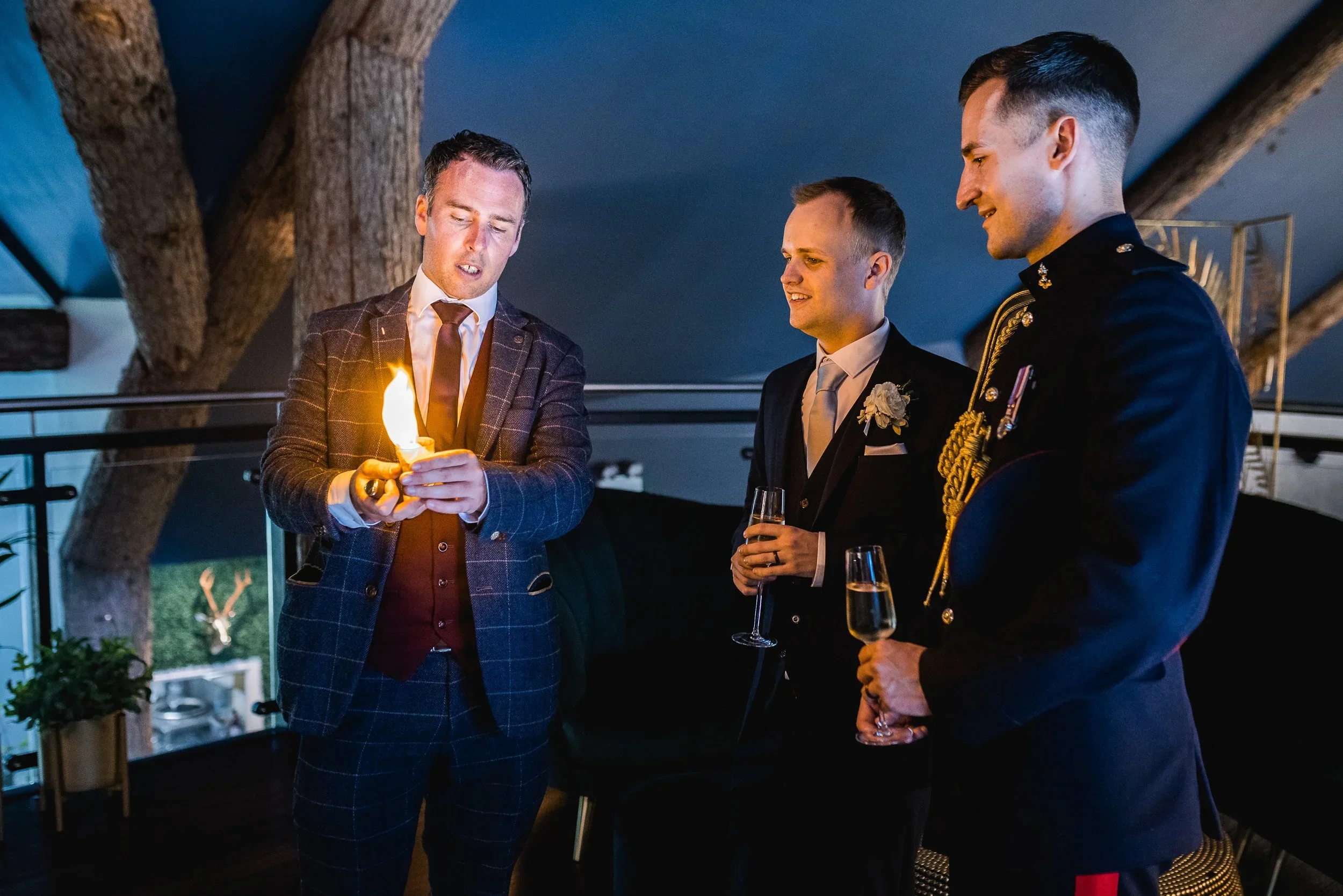 Magician Rich Reynolds performing a fire magic trick for guests during the evening reception at Oaklands Grand Lodge in Driffield.