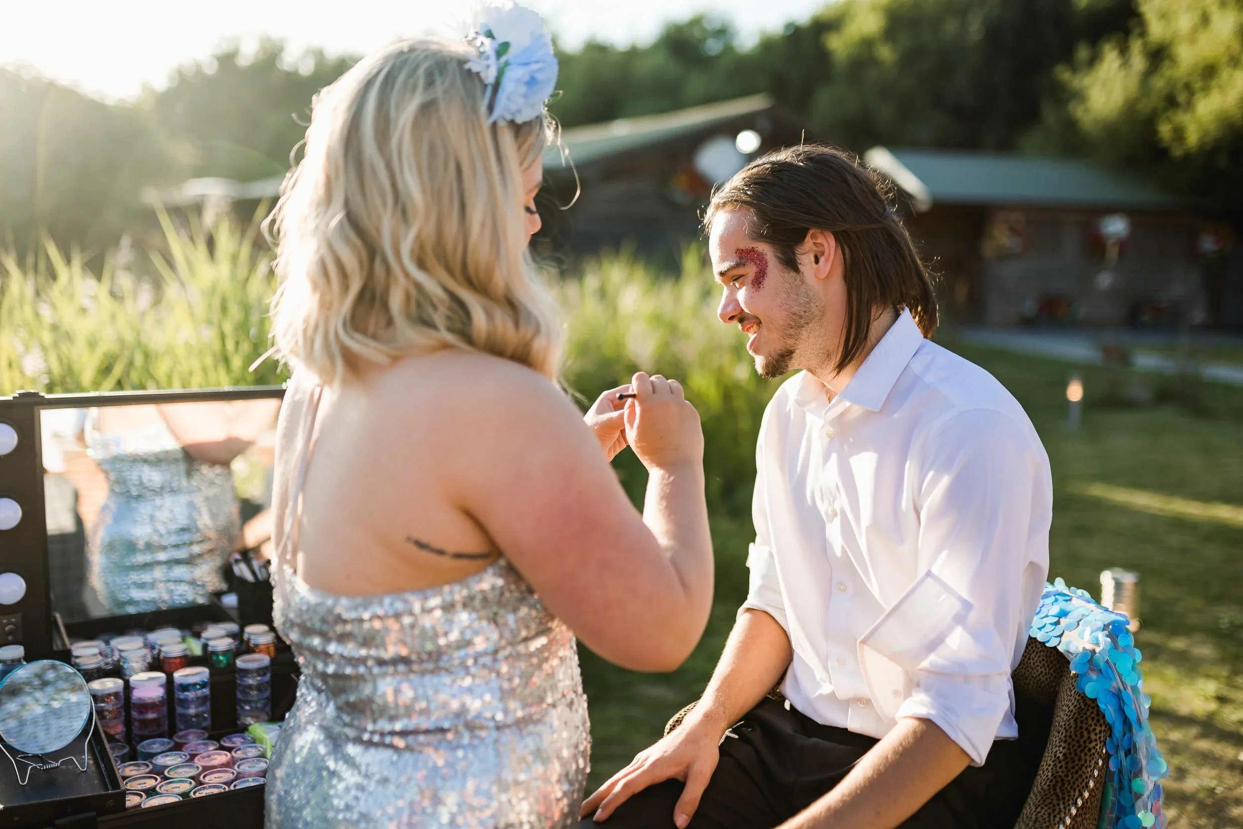 Festival style wedding entertainment with face painting at Oaklands Grand Lodge reception in Driffield.