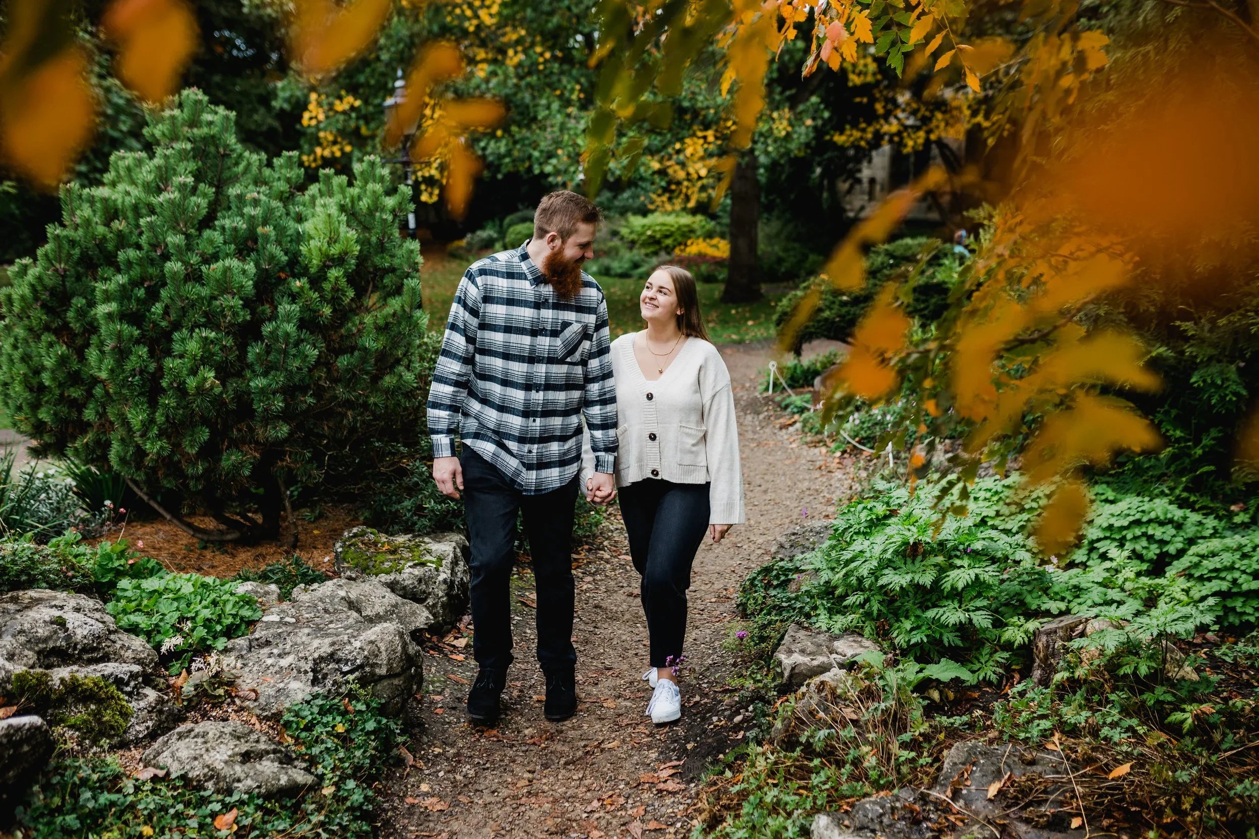 A couple walking through museum gardens York