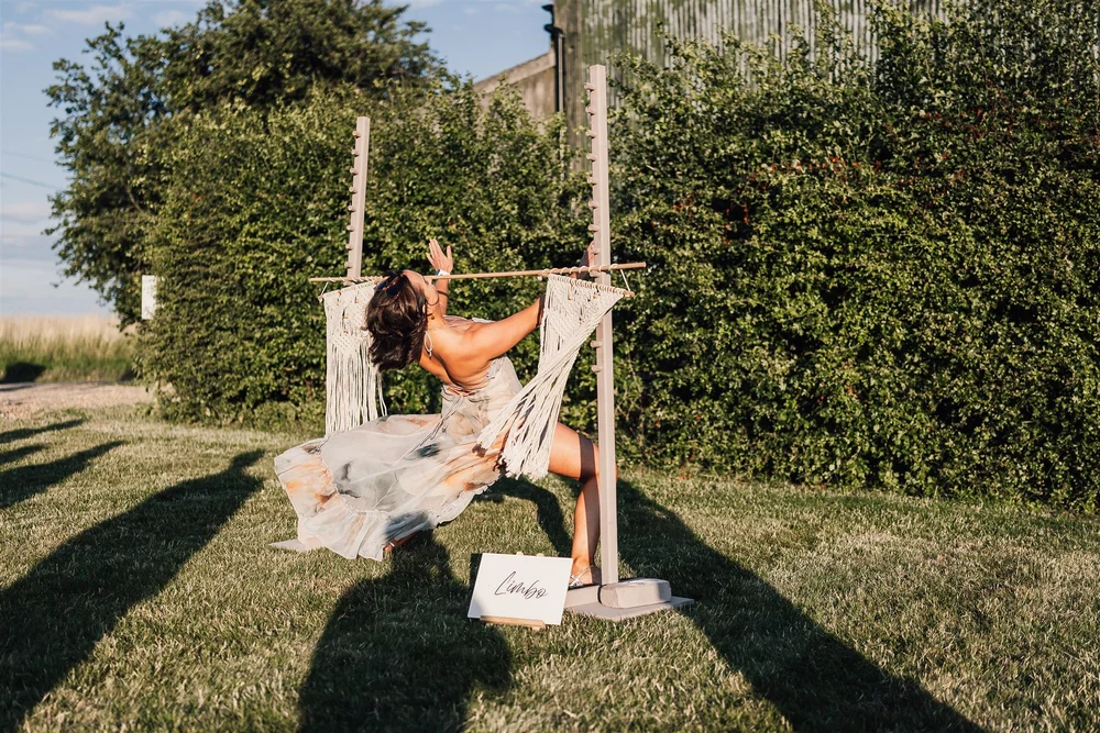 A playful swing moment at Ellie and Dave’s Riverlands wedding