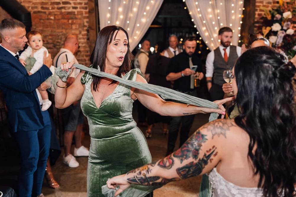 Lively celebrations and playful sword fighting at Ellie and Dave’s Riverlands wedding