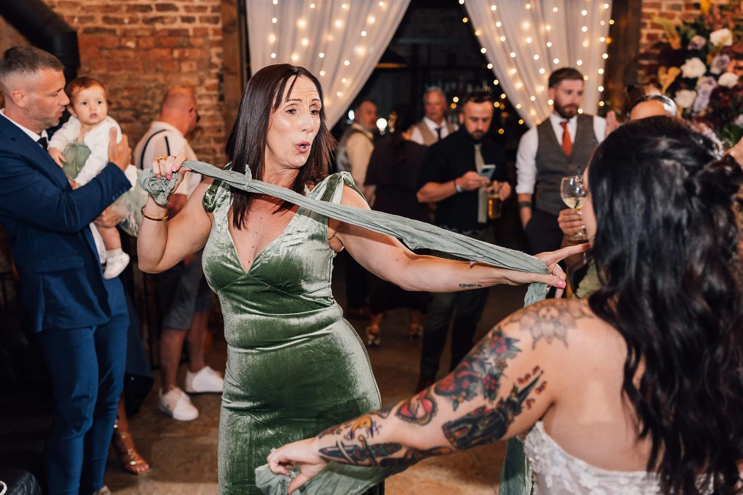 Lively celebrations and playful sword fighting at Ellie and Dave’s Riverlands wedding