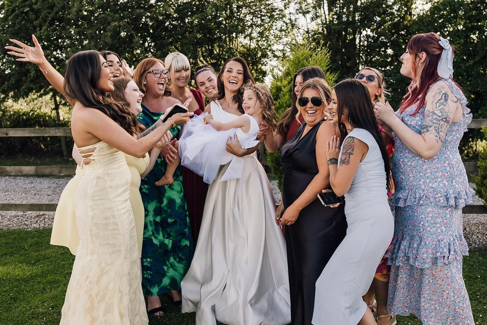 Becky and her friends celebrating on the lawn at The Barn at Willerby
