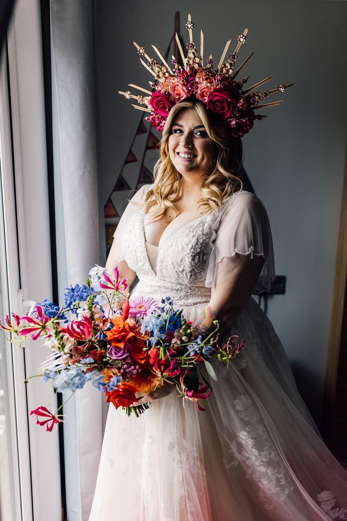 Chloe in her pink-dipped wedding dress and colourful floral crown