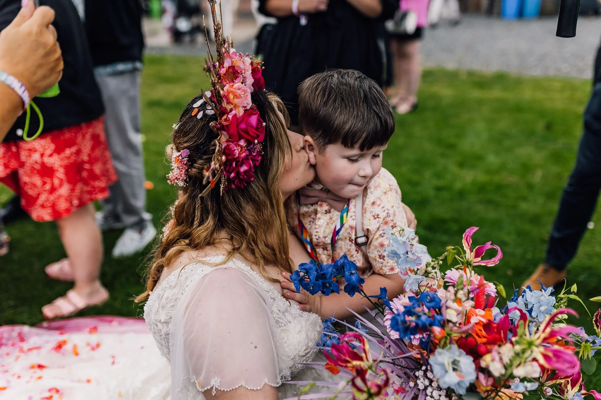 Chloe hugging a young wedding guest