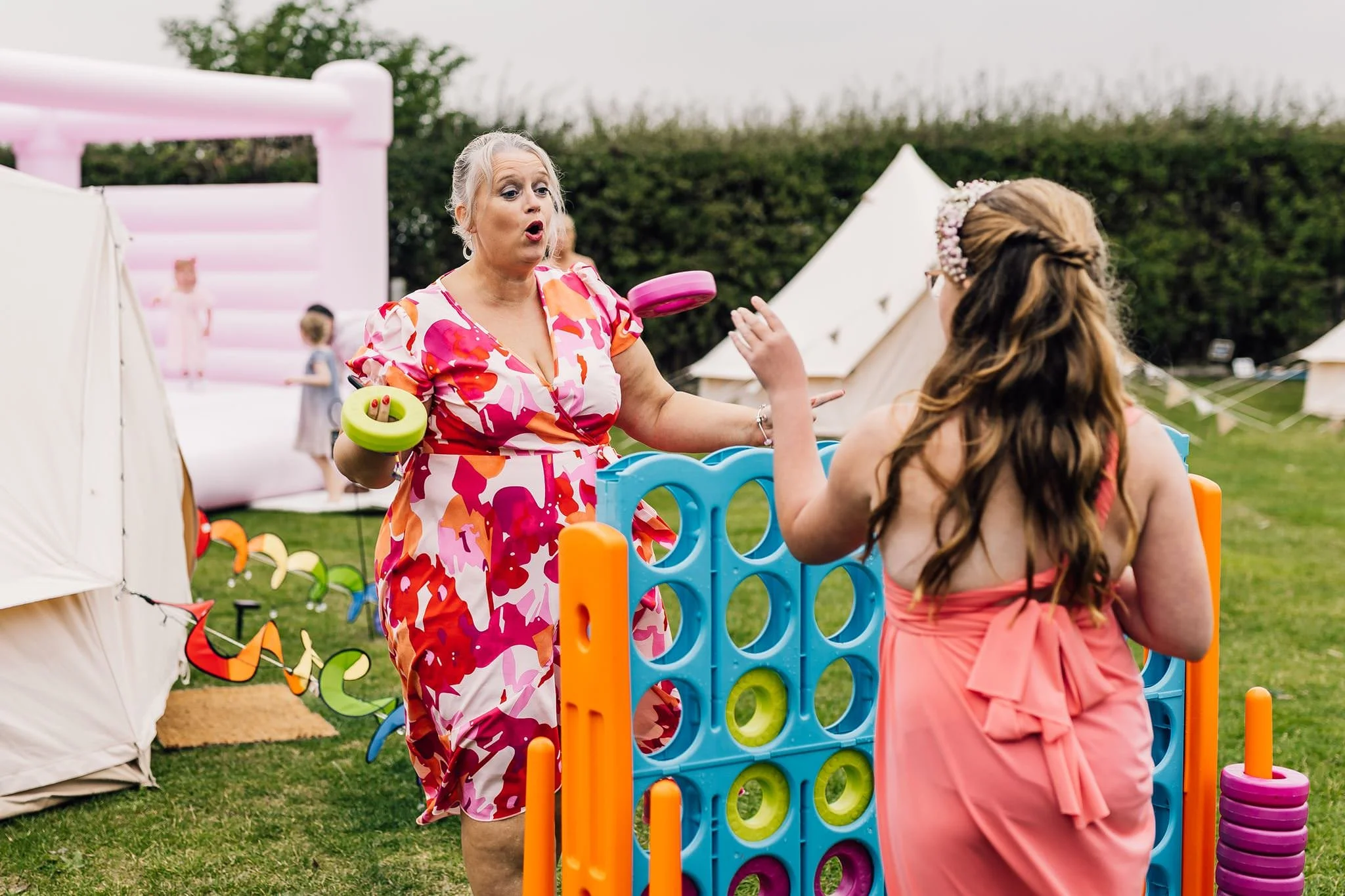 Wedding guests playing a giant Connect Four game