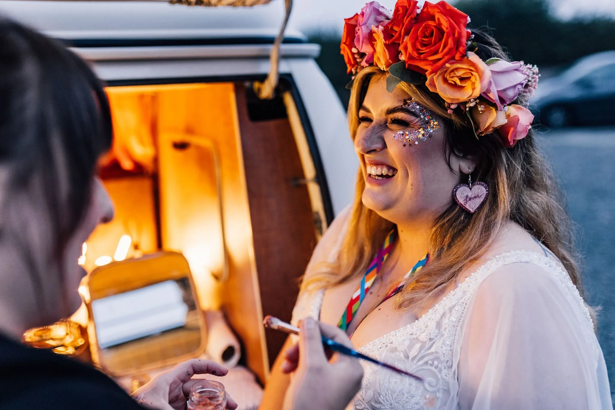 Chloe laughing inside the VW wedding photobooth