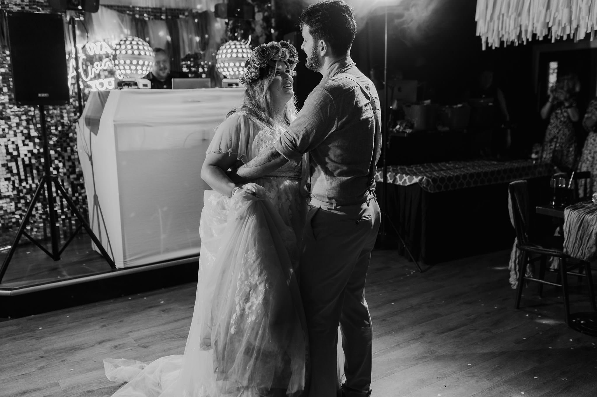 Black and white photograph of Chloe and Aaron’s first dance