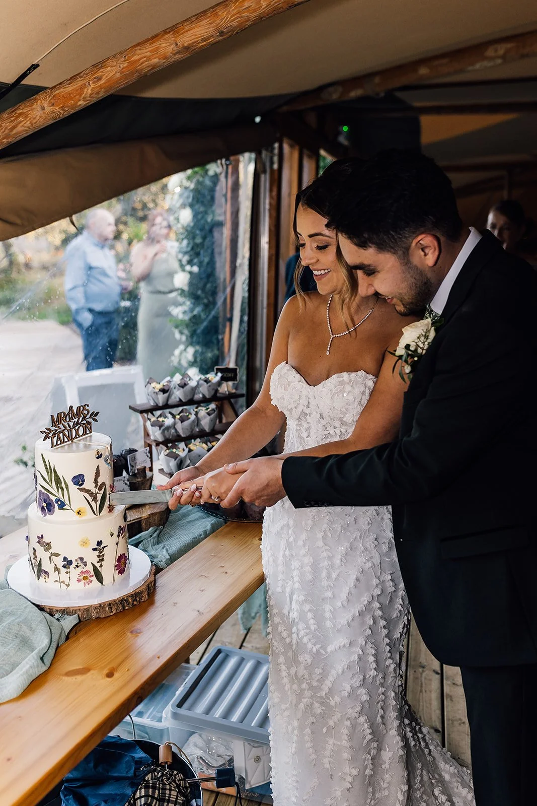 A candid moment with Charlotte and Rory indoors during their wedding day