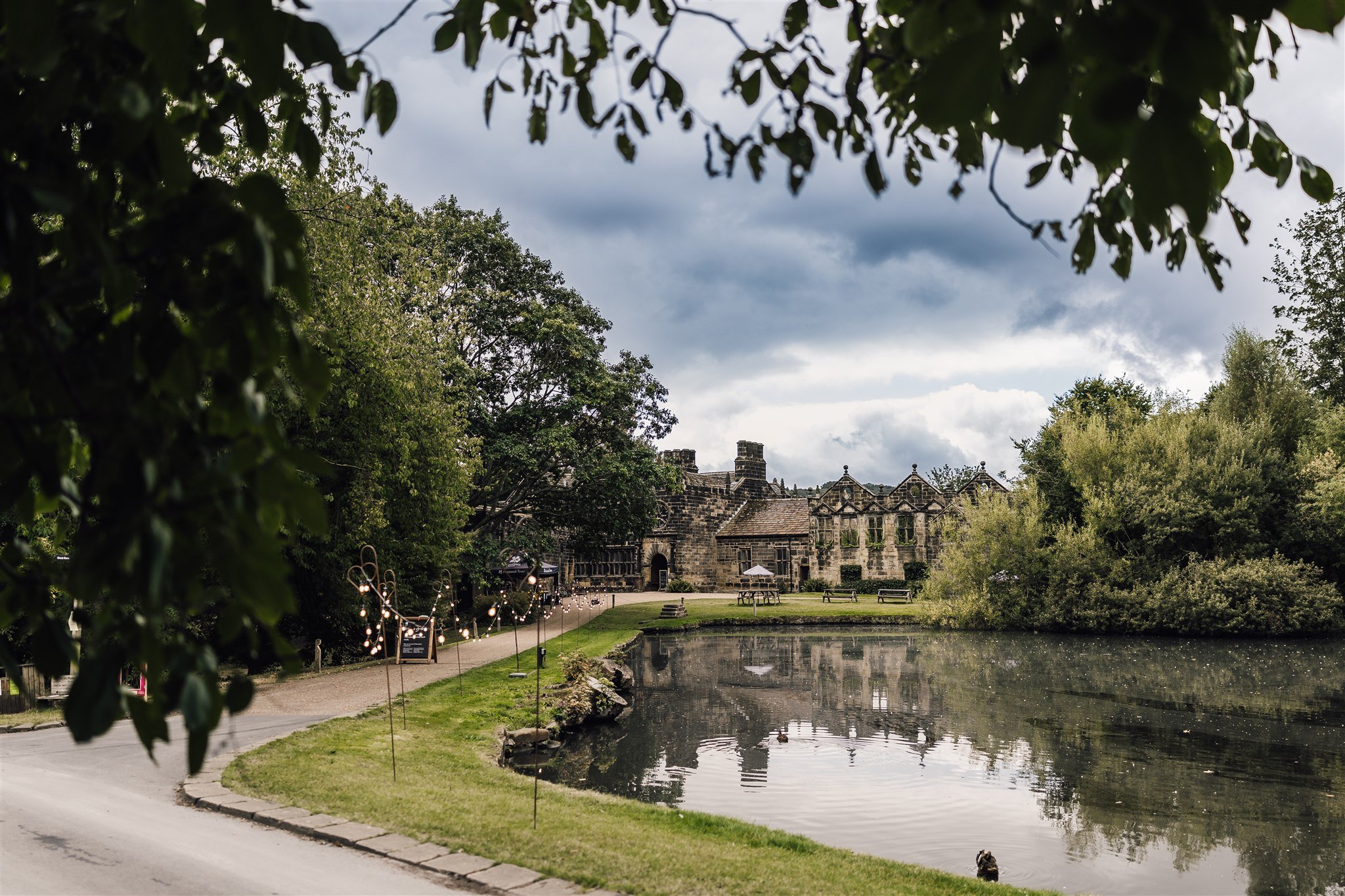 East Riddlesden Hall wedding venue in West Yorkshire with lake, gardens and historic stone buildings