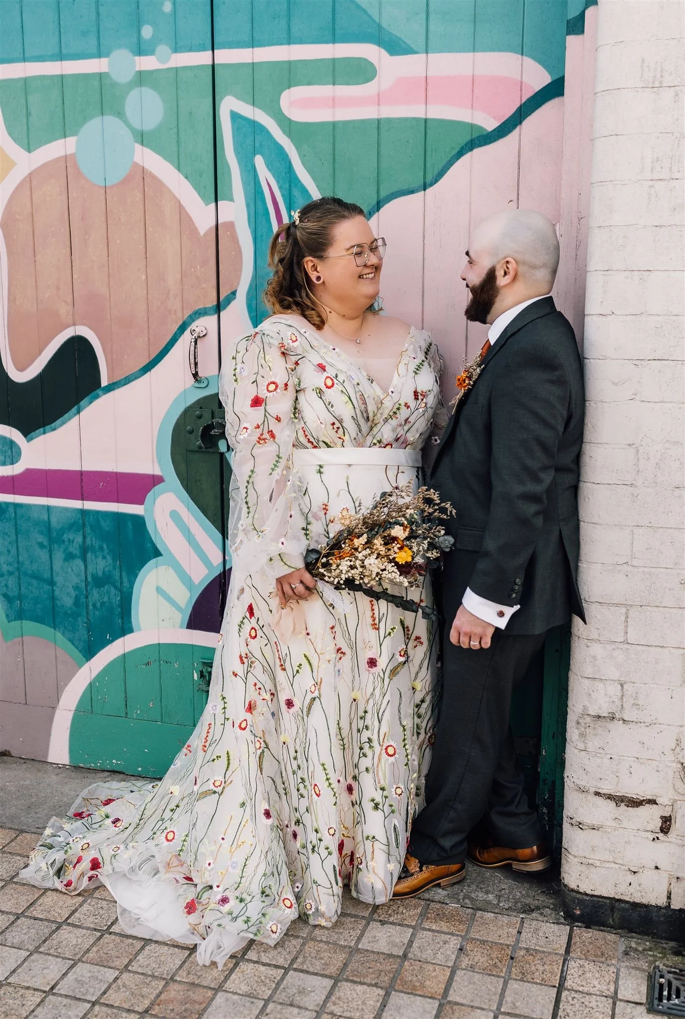 Wedding Couple on Humberstreet, hull infront of colourful wall