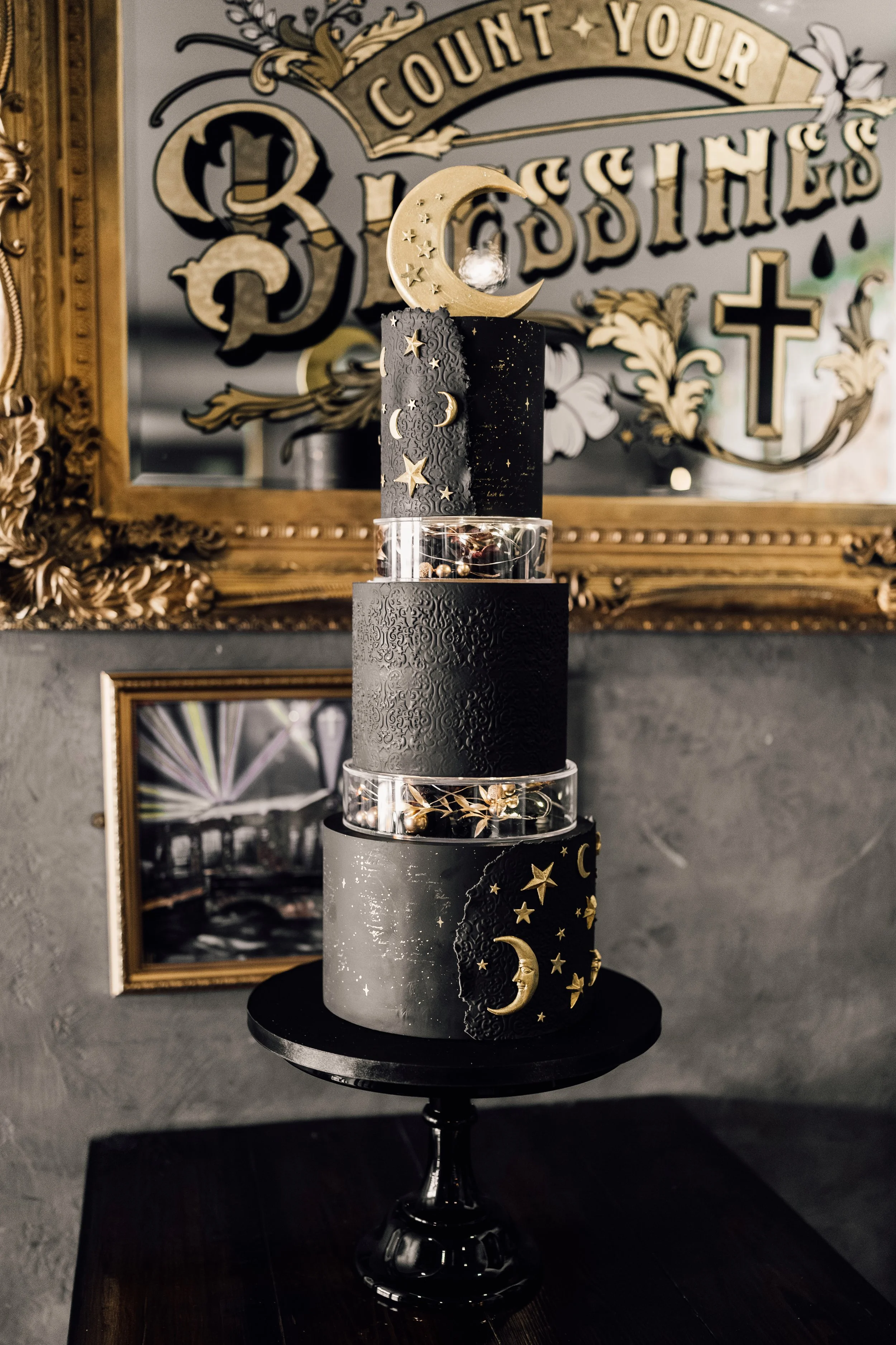 Alternative wedding cake with moon and stars at Church Temple of Fun Sheffield wedding venue