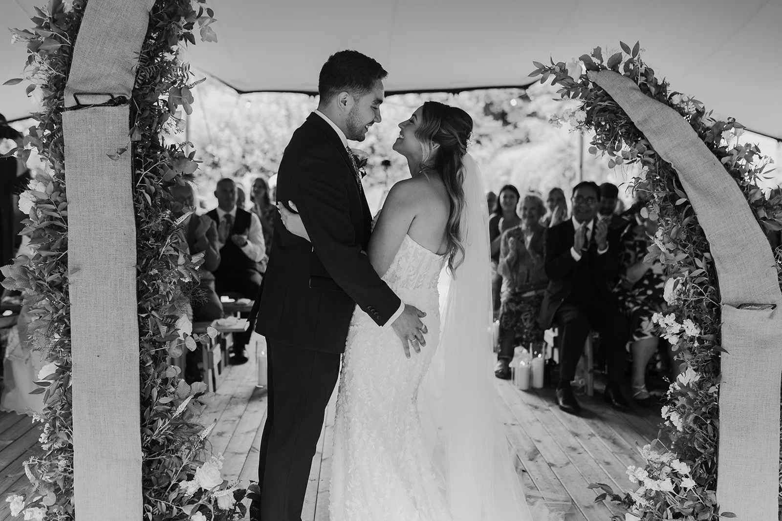 Black and white photograph of Charlotte and Rory during the ceremony