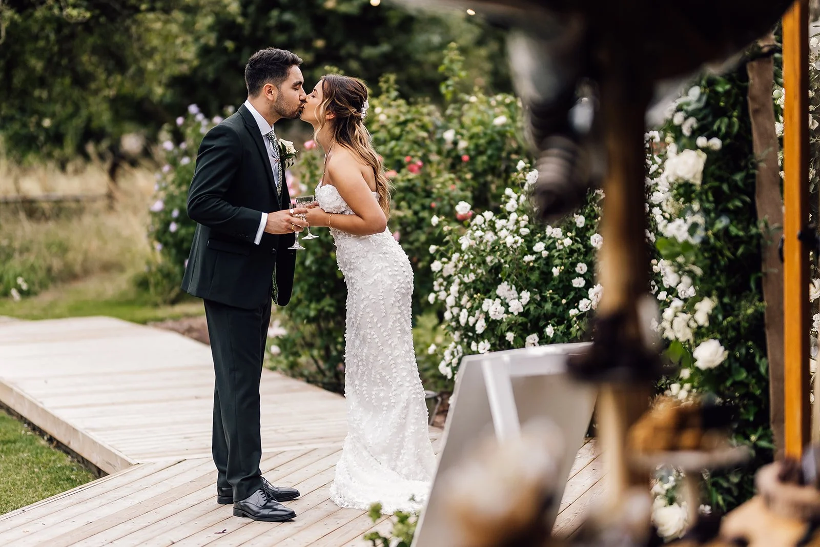 Charlotte and Rory together beneath the covered ceremony canopy