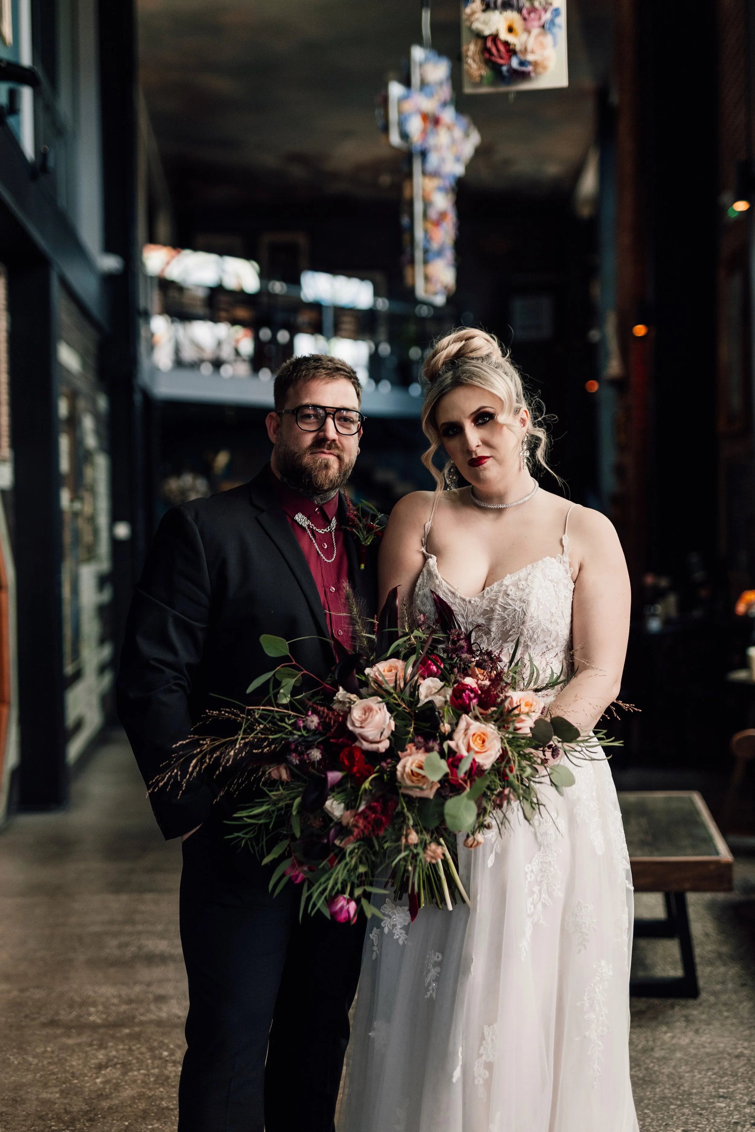Alternative bride and groom portrait inside Church Temple of Fun wedding venue Sheffield