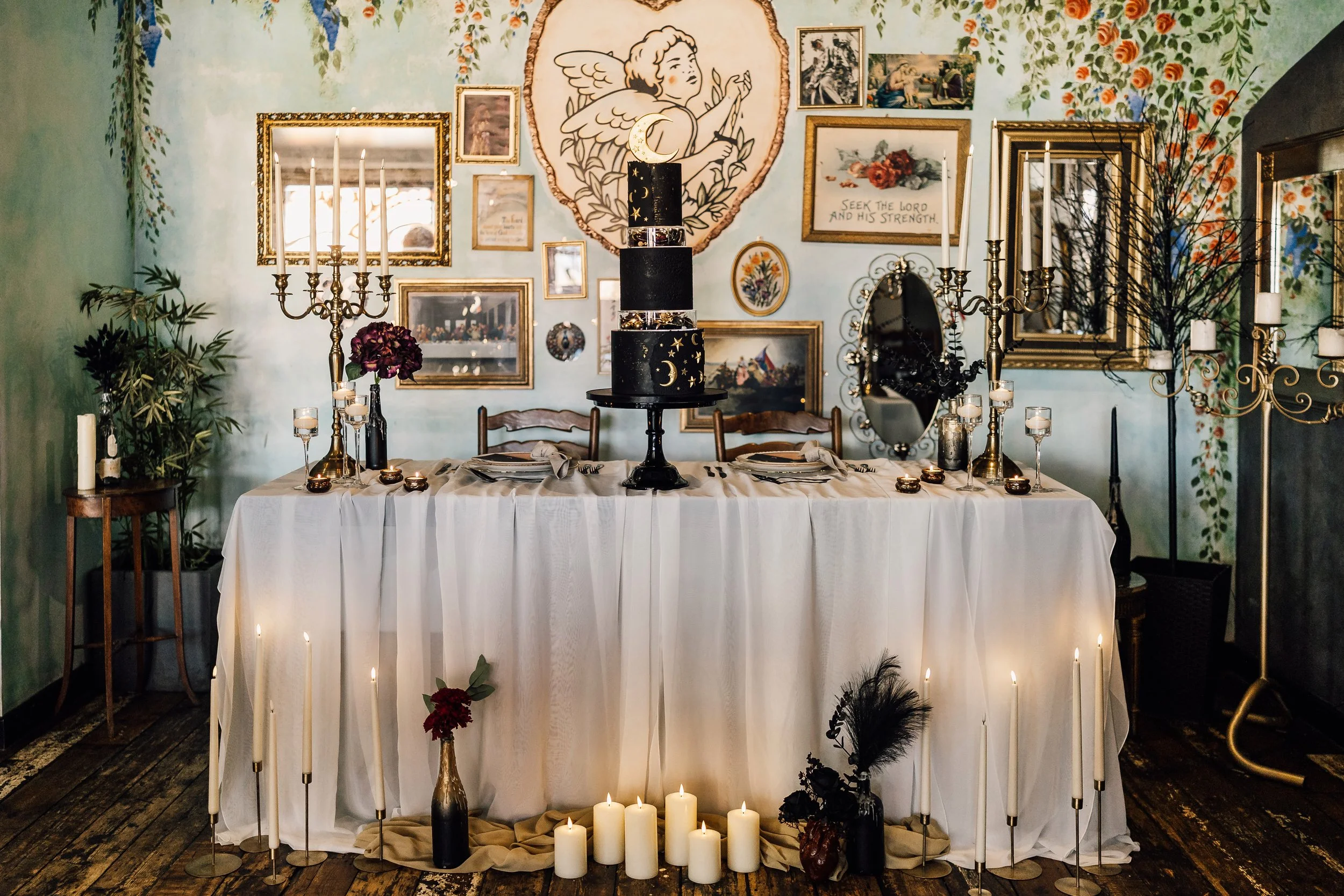 Alternative wedding cake table styling with celestial theme at Church Temple of Fun Sheffield