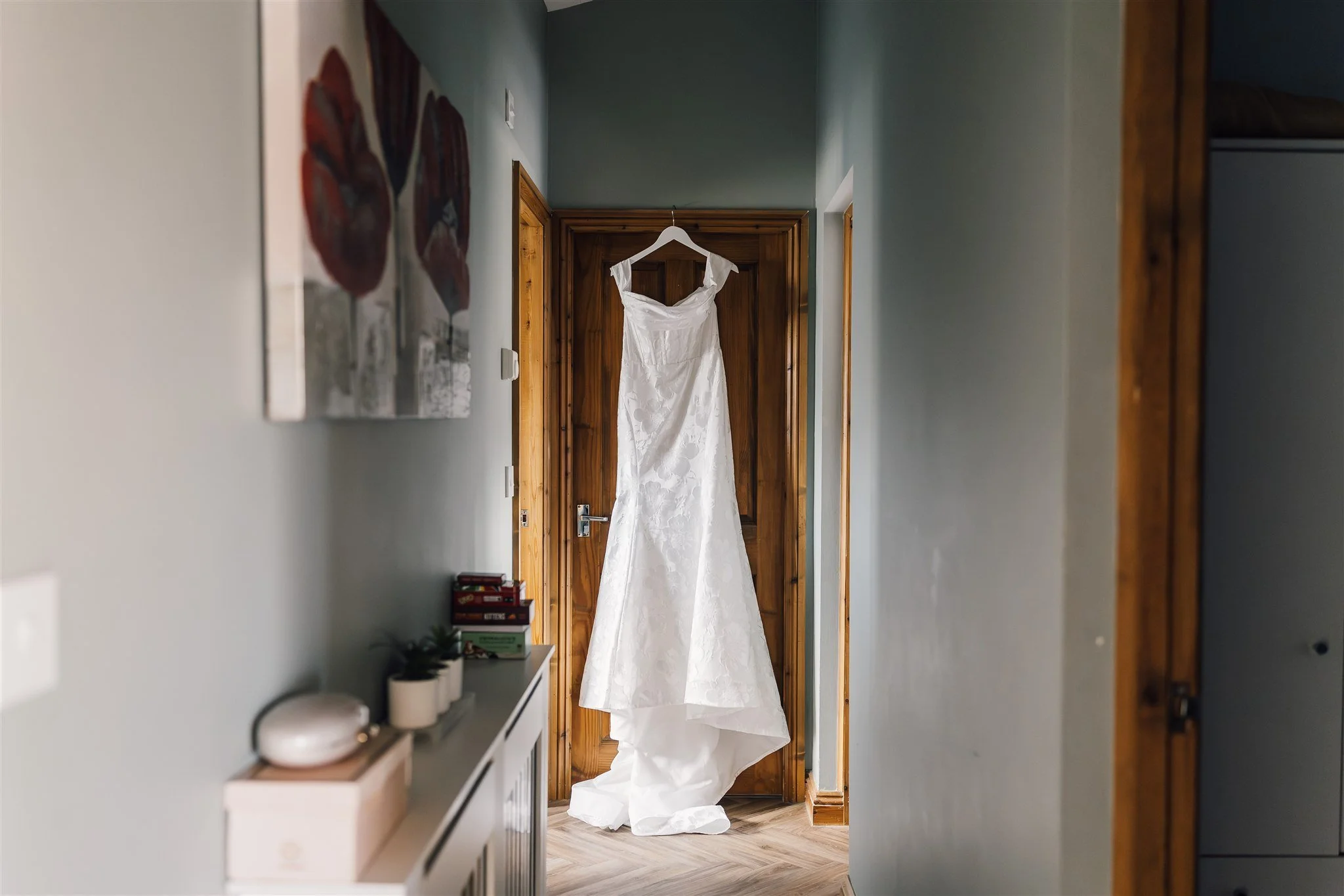 Wedding Dress Hanging on a door fram