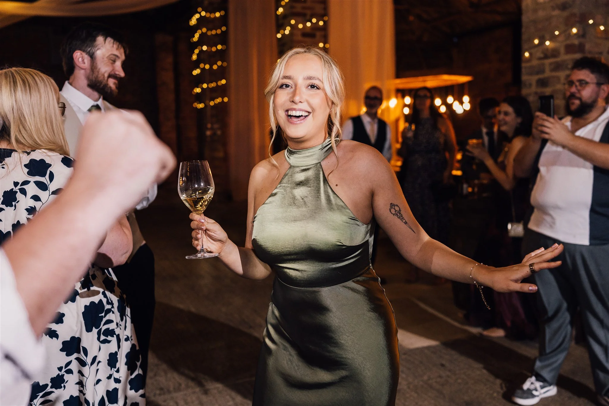 Bridesmaid having fun at White Syke Fields