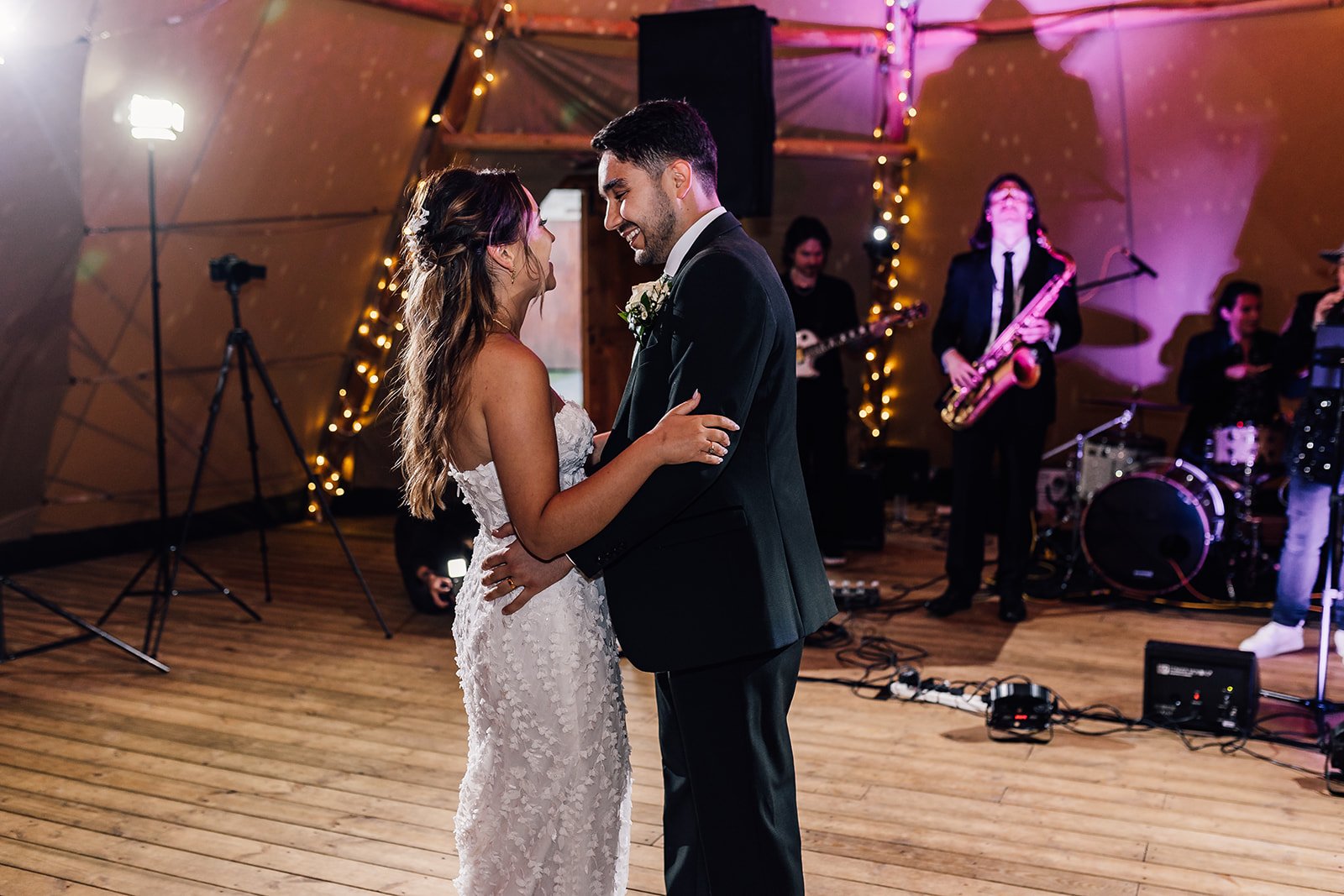 Charlotte and Rory enjoying their first dance with the live band behind them