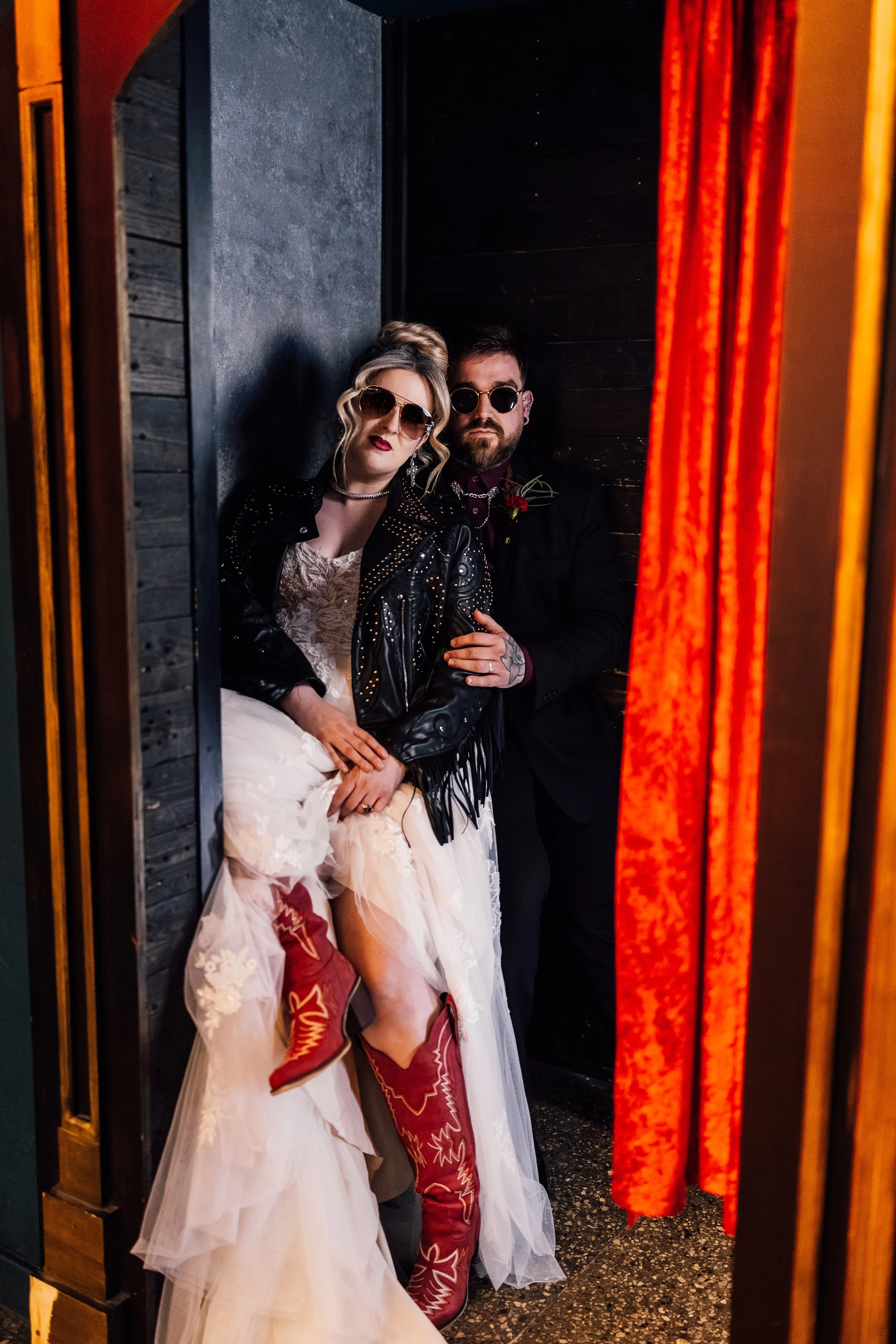Alternative wedding couple portrait in moody doorway at Church Temple of Fun Sheffield