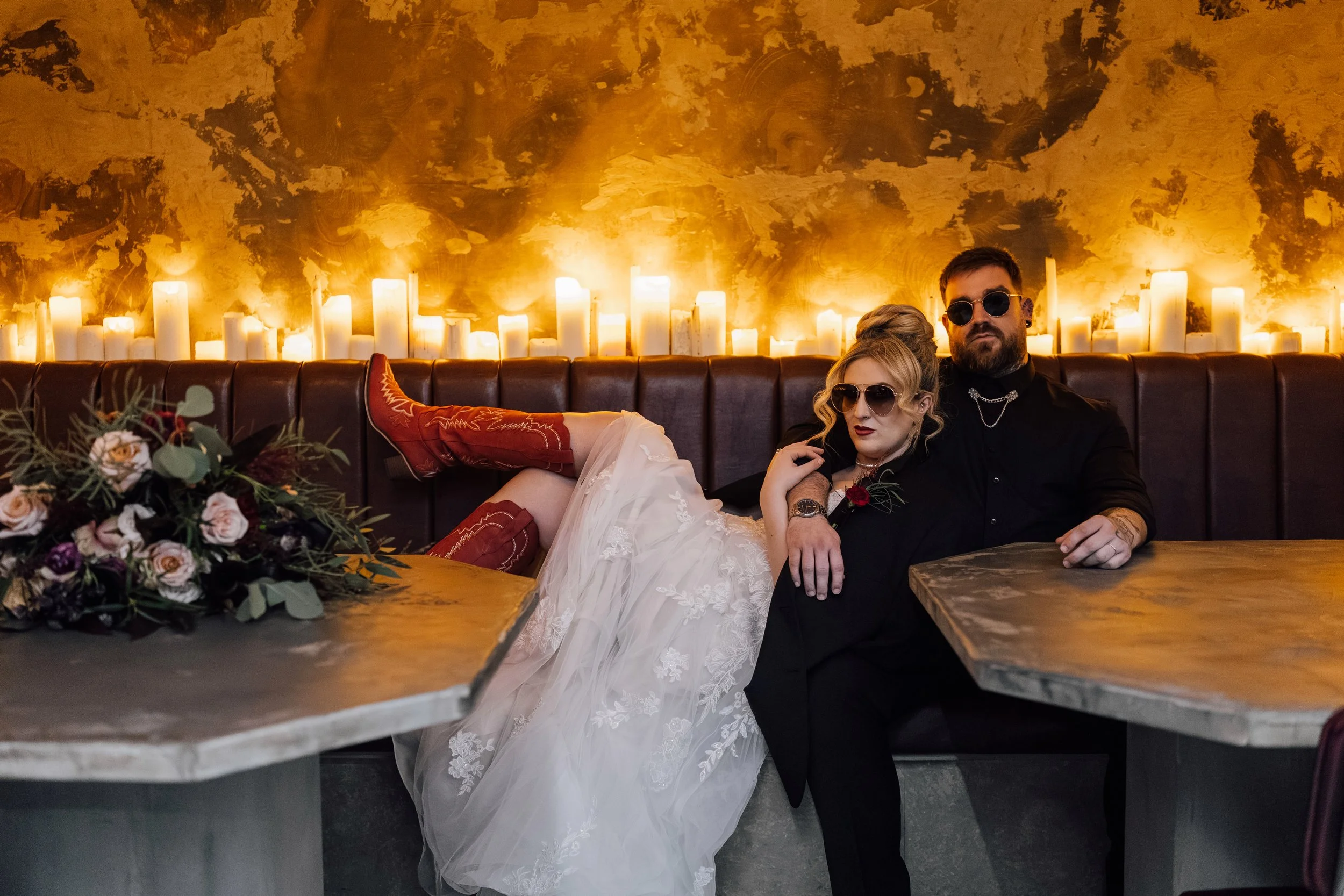 Relaxed alternative wedding couple in booth at Church Temple of Fun Sheffield wedding