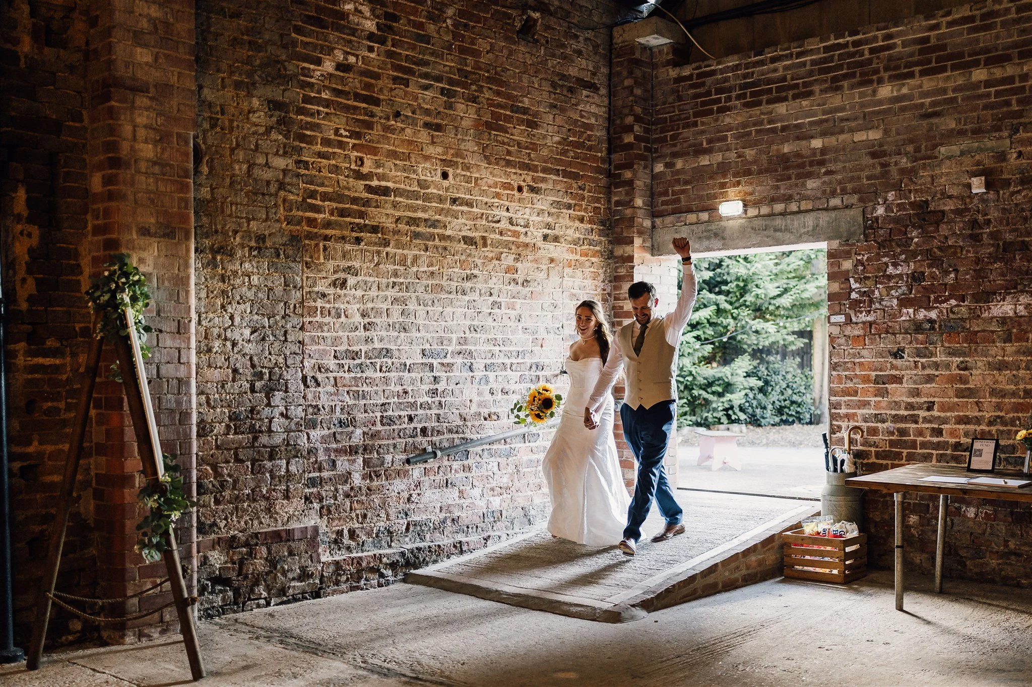 bride and groom making entrance to the wheel house White Syke Fields