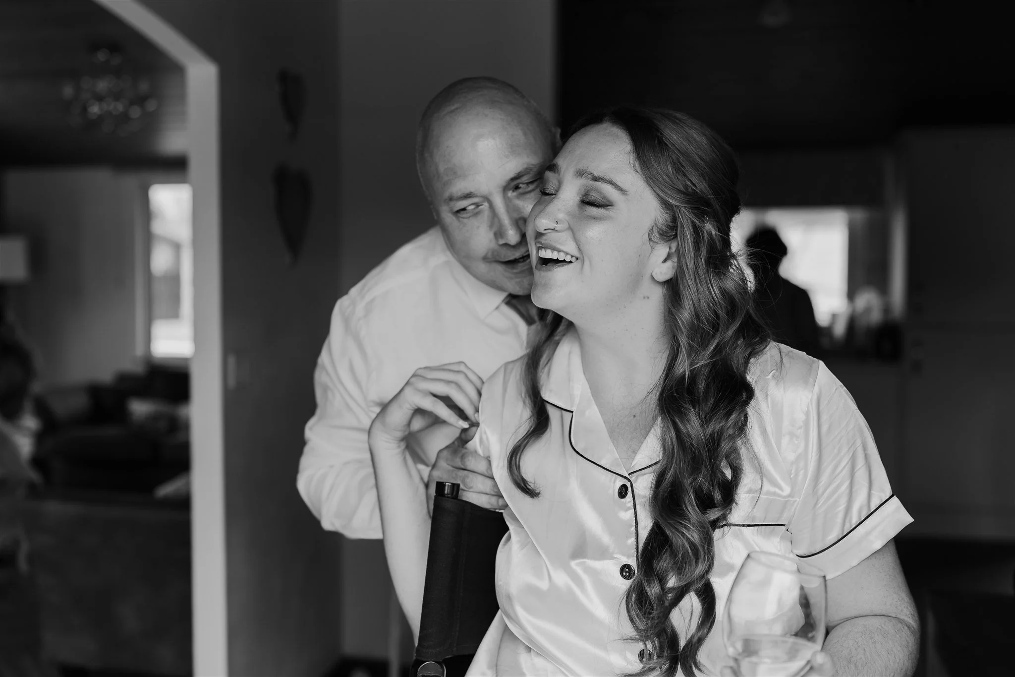 Bride seeing dad In the morning whilst getting ready