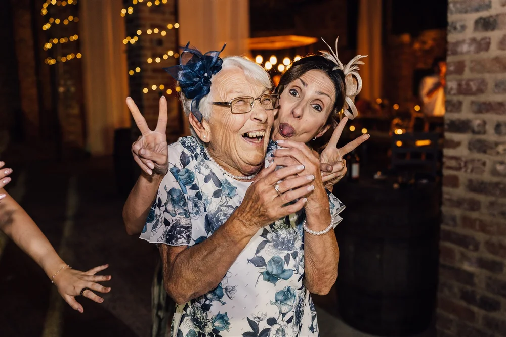 Wedding guests having fun at Lauren and Ben’s evening party