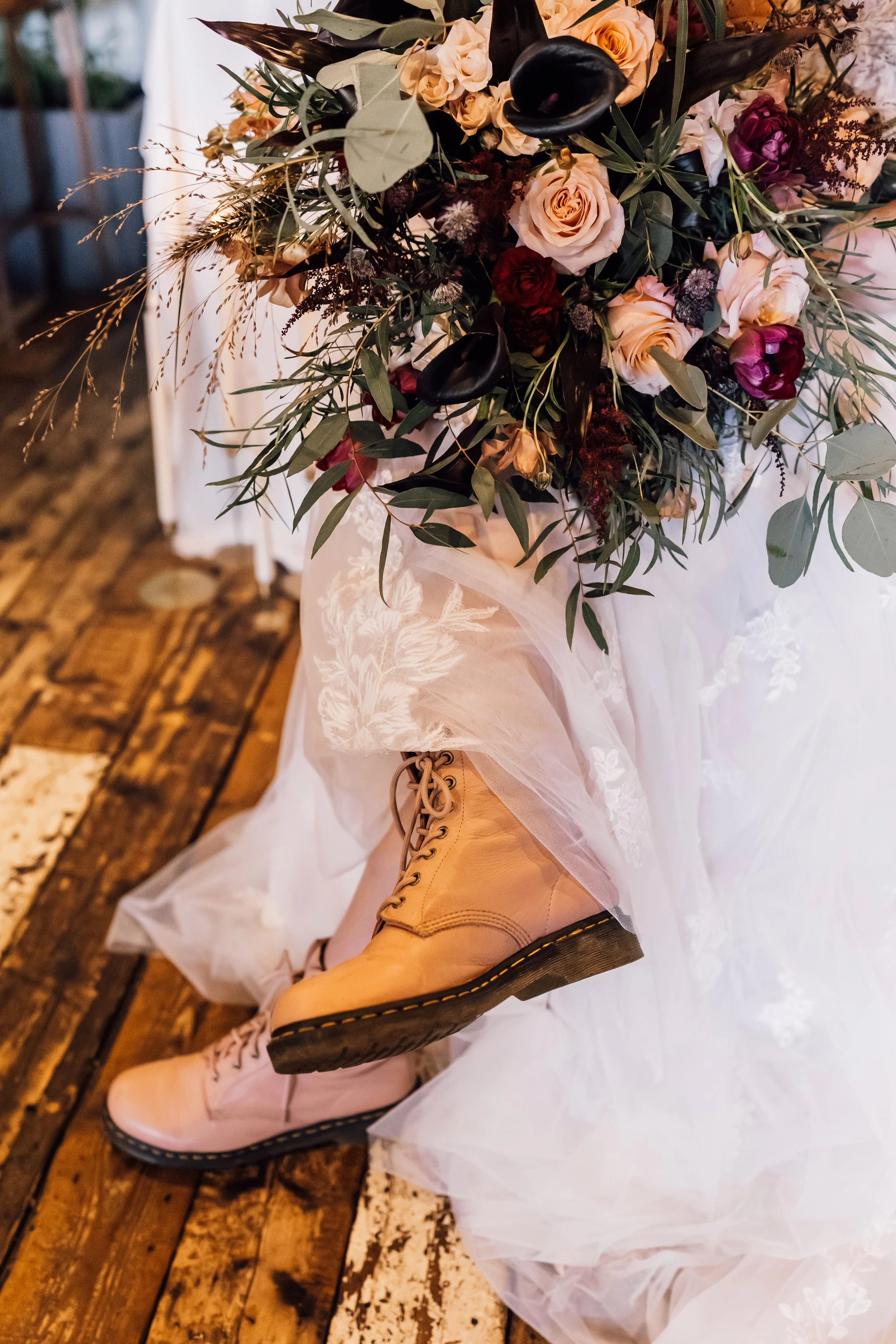 Bride wearing Dr Martens boots with wedding dress at Church Temple of Fun wedding Sheffield