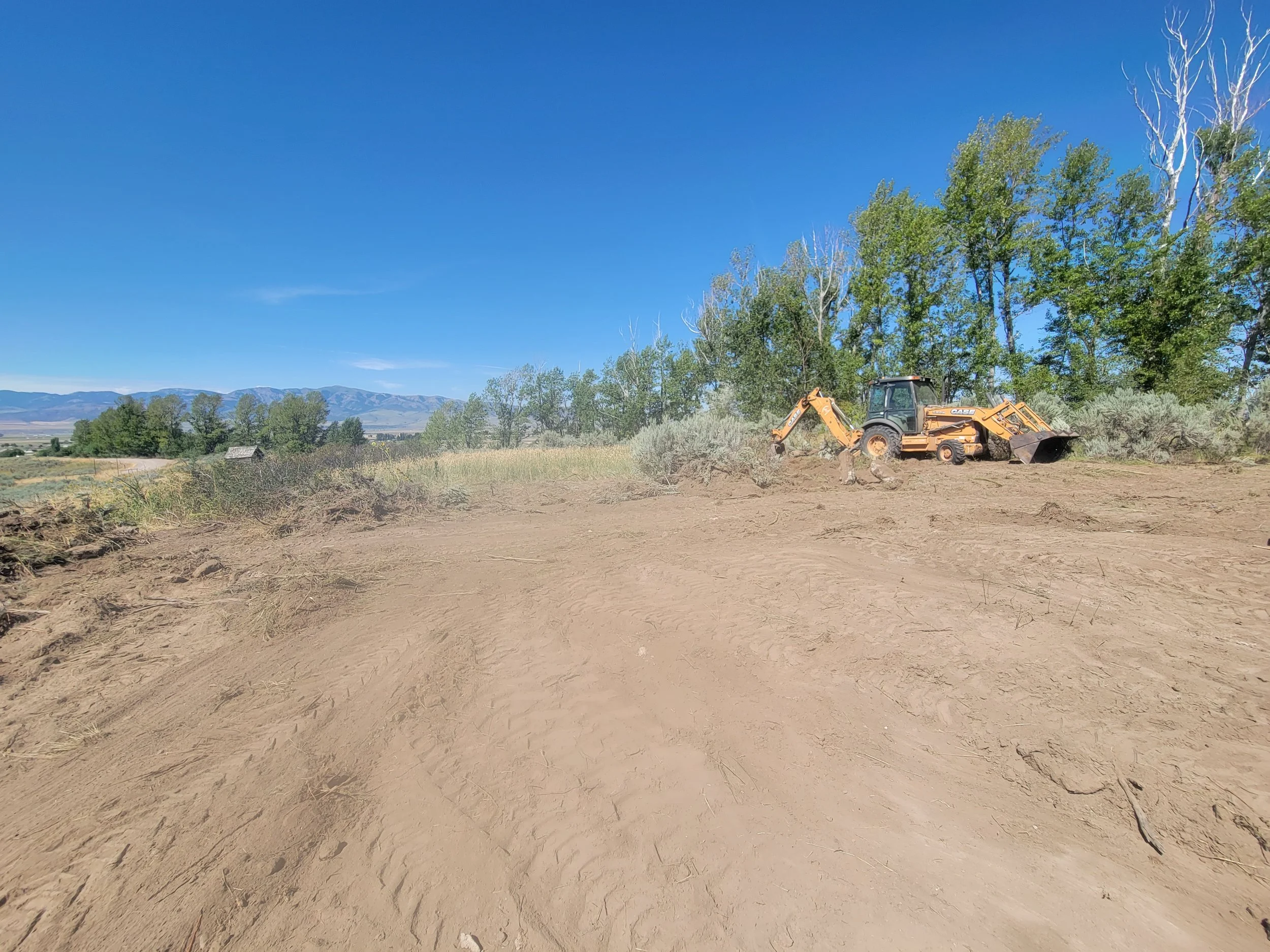 Land Clearing, Backhoe work, Excavation, Sagebrush, dump truck