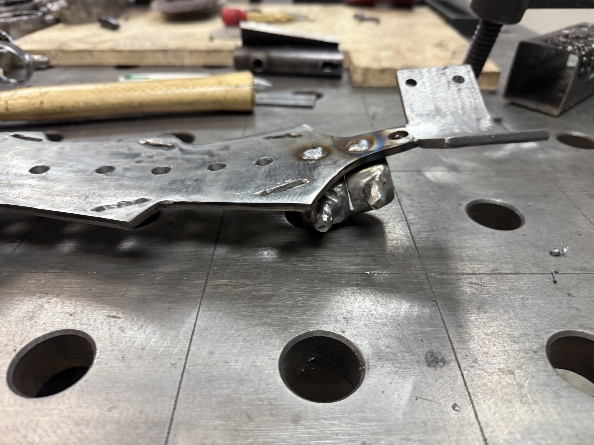 MIG welding the vertebrae to the backbone
