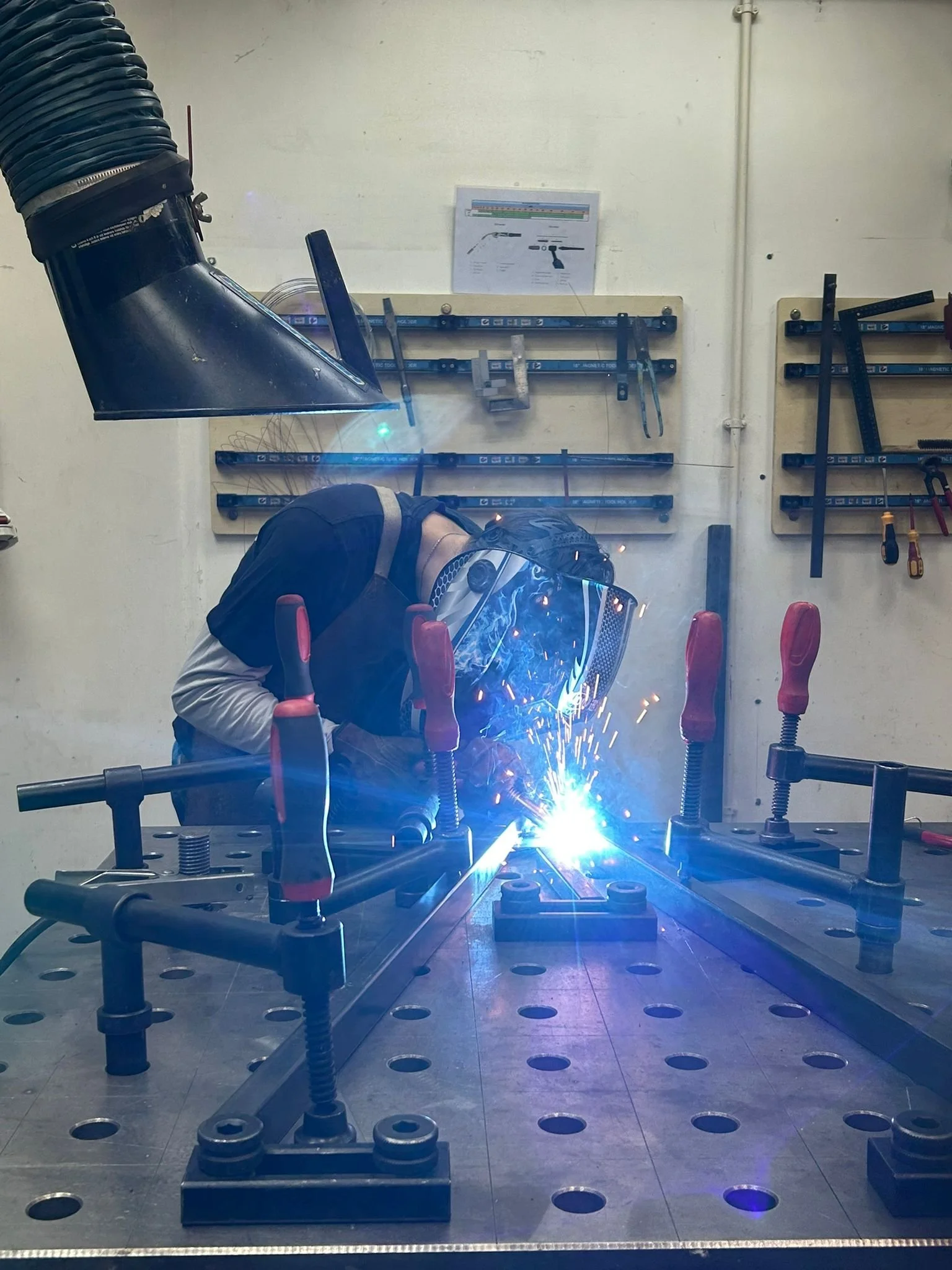 MIG welding the vertebrae to the backbone