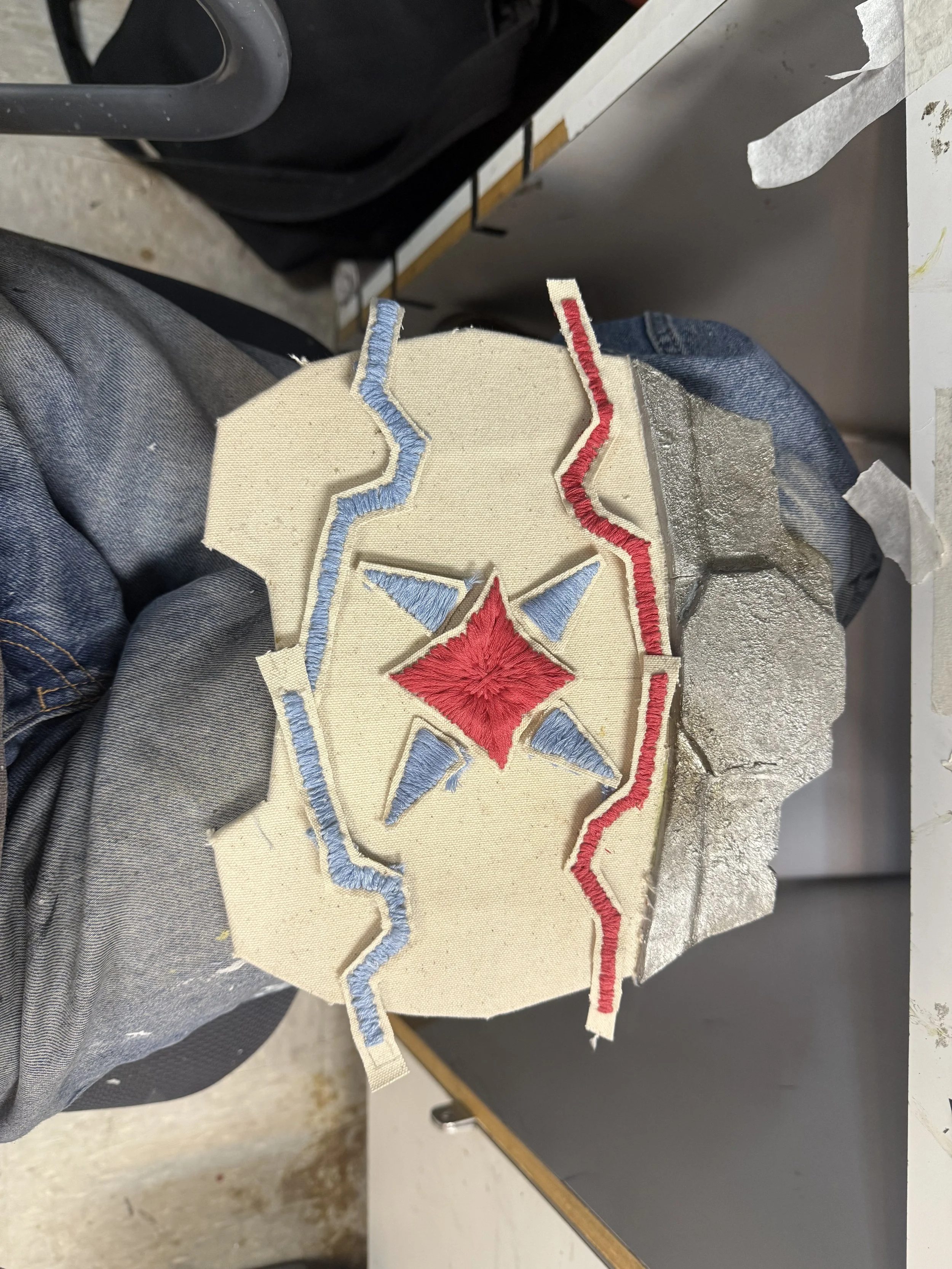 Attaching embroidery and fabric 