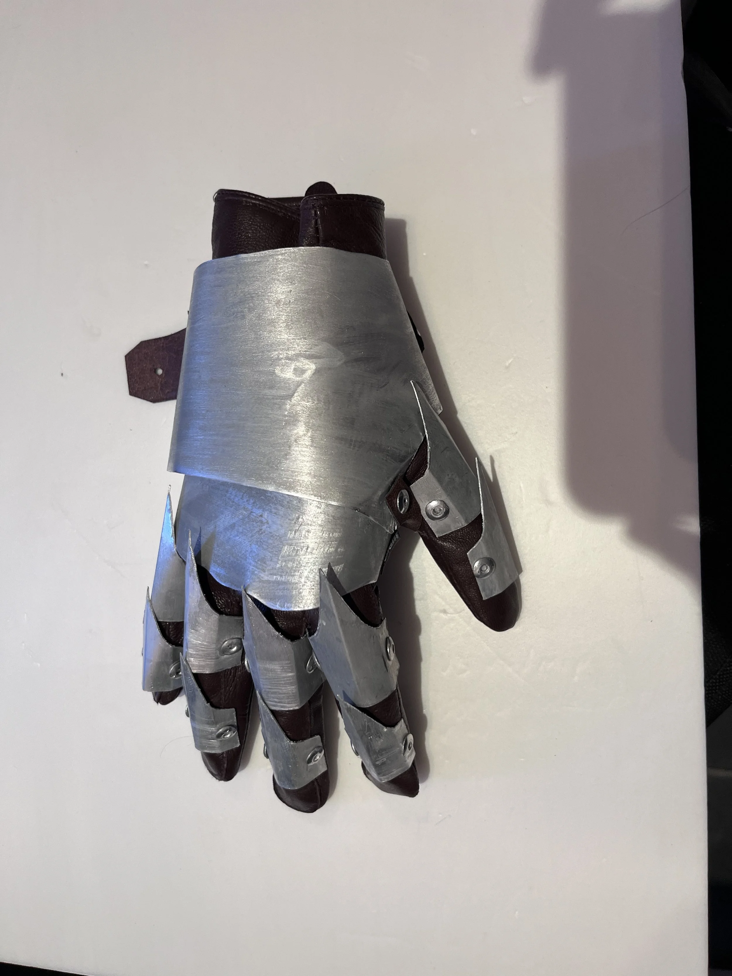 Attaching the finger segments to the glove