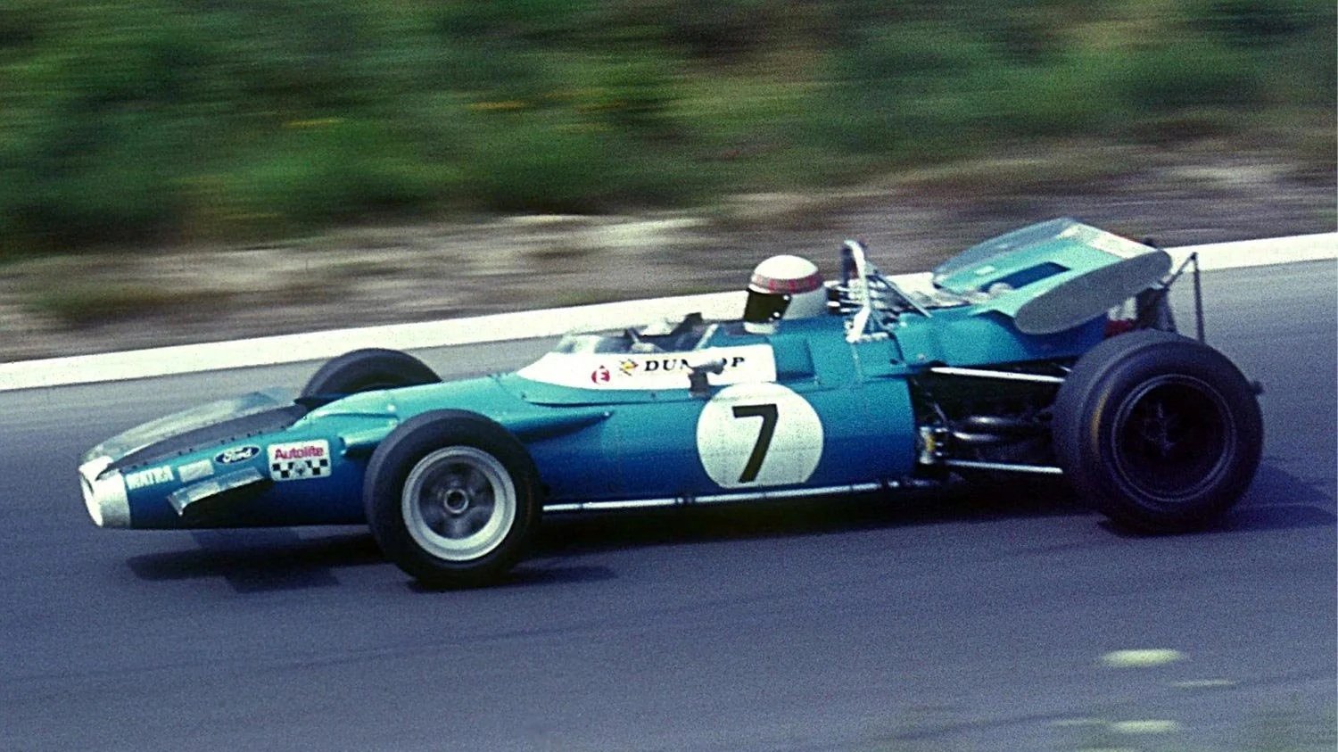 Jackie Stwart driving the Matra MS80 run by Ken Tyrrell in 1969.