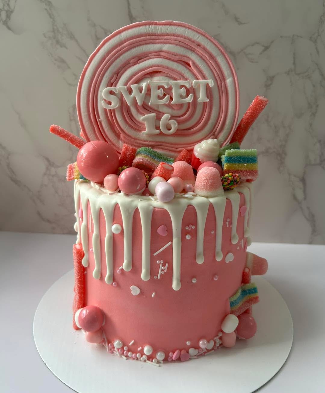 Celebrating a sweet 16 with cake &amp; candy 🍭

Made with red velvet cake layers, chocolate ganache filling, cream cheese icing, a white chocolate drip and all the candy you could need!🍫🍬

#bakingfromscratch #customcakes #celebrate #pembrokebaker 