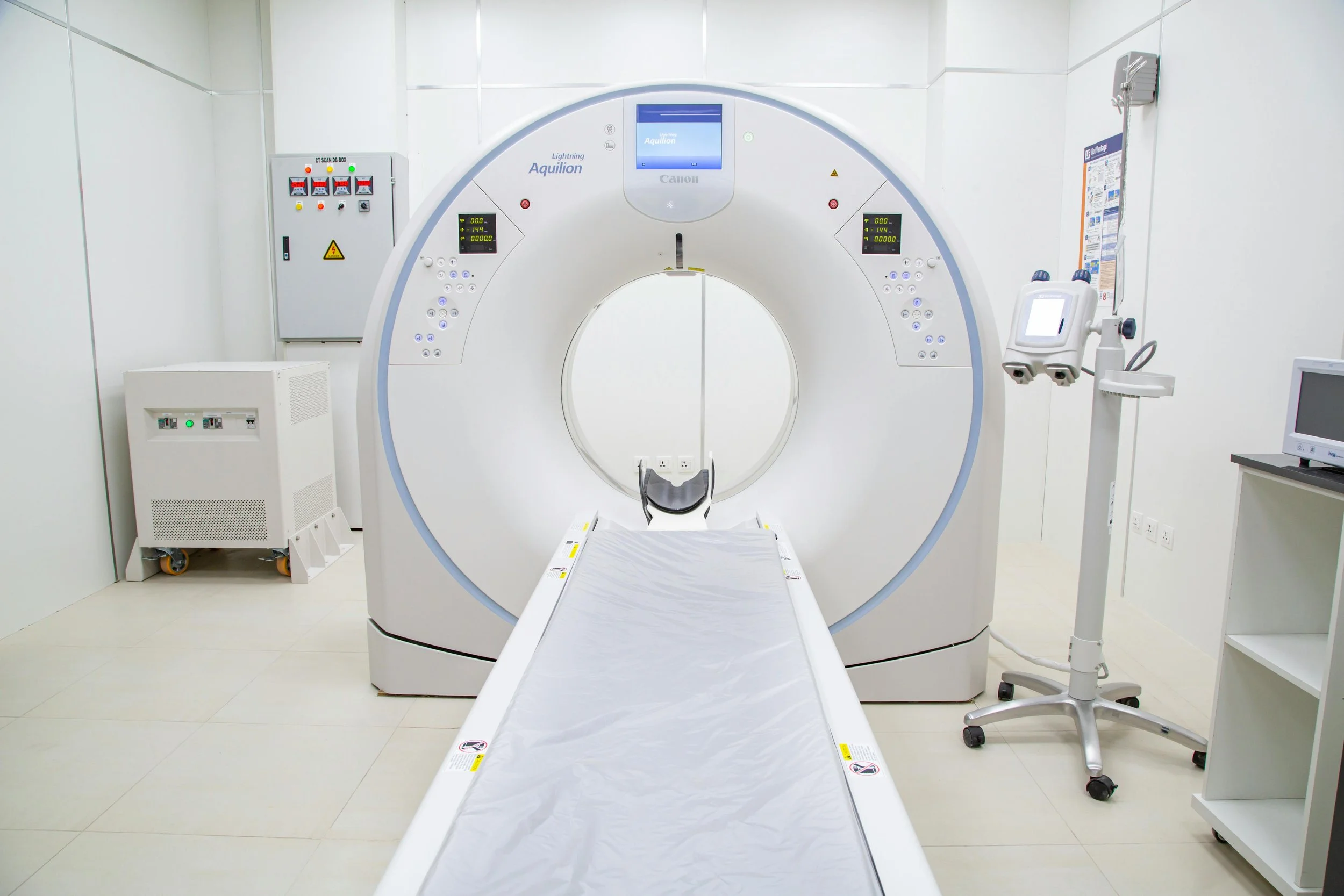 Medical imaging room with a large MRI scanner and examination table, illustrating environments where non‑magnetic, non‑conductive GFRP composite rebar is essential for safety and interference‑free operation.
