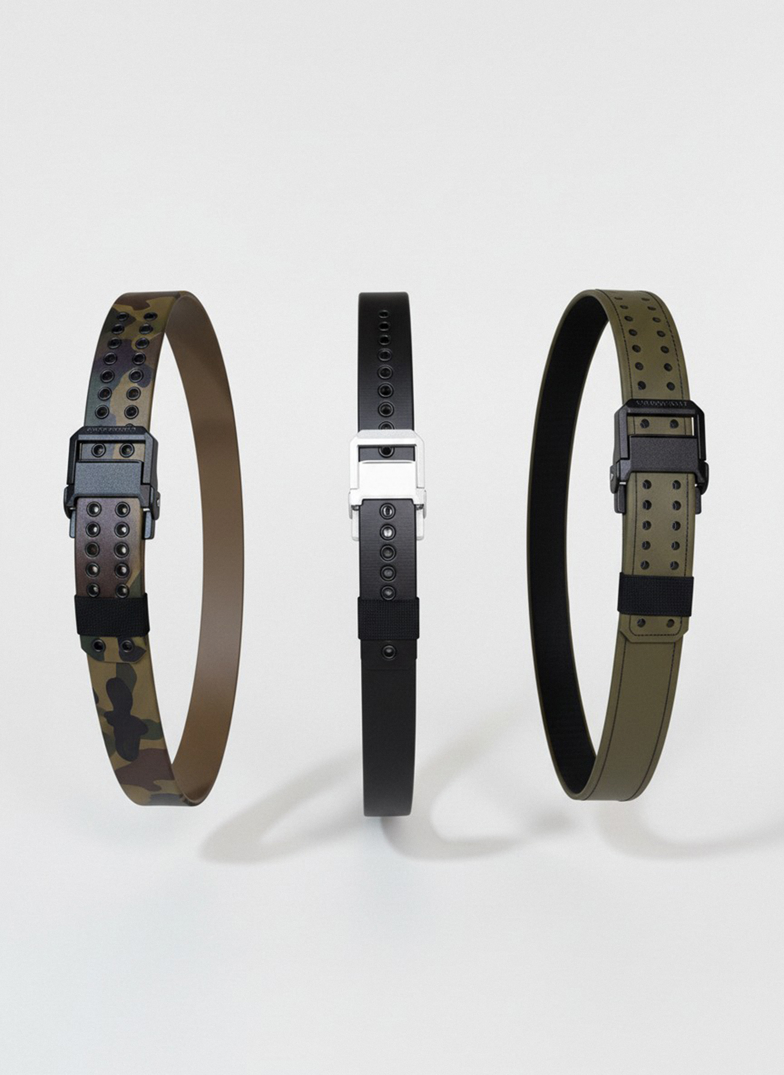 Three smart bracelet bands with different colors and patterns, arranged vertically against a plain background.