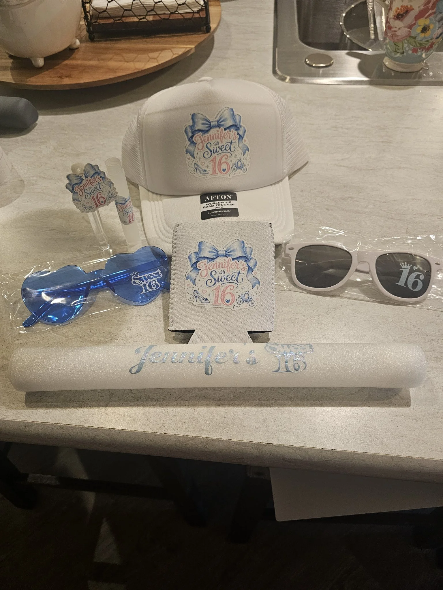 Custom Sweet 16 merch flatlay with personalized chip bags and tumbler by Veach's Tennessee Touch