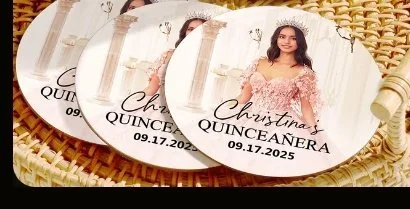 Personalized "Christina's Quinceañera 09.17.2025" car coasters in a wicker basket by Veach's Tennessee Touch