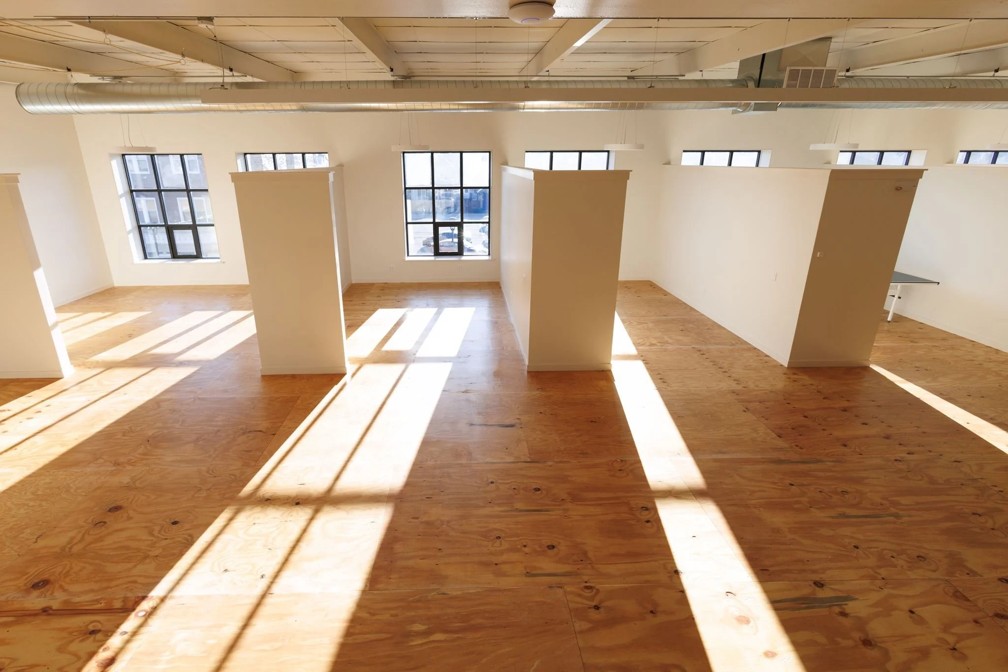 Sunlight streams into the bright, open gallery space at PinDeck Studios & Gallery in Ambridge, PA.