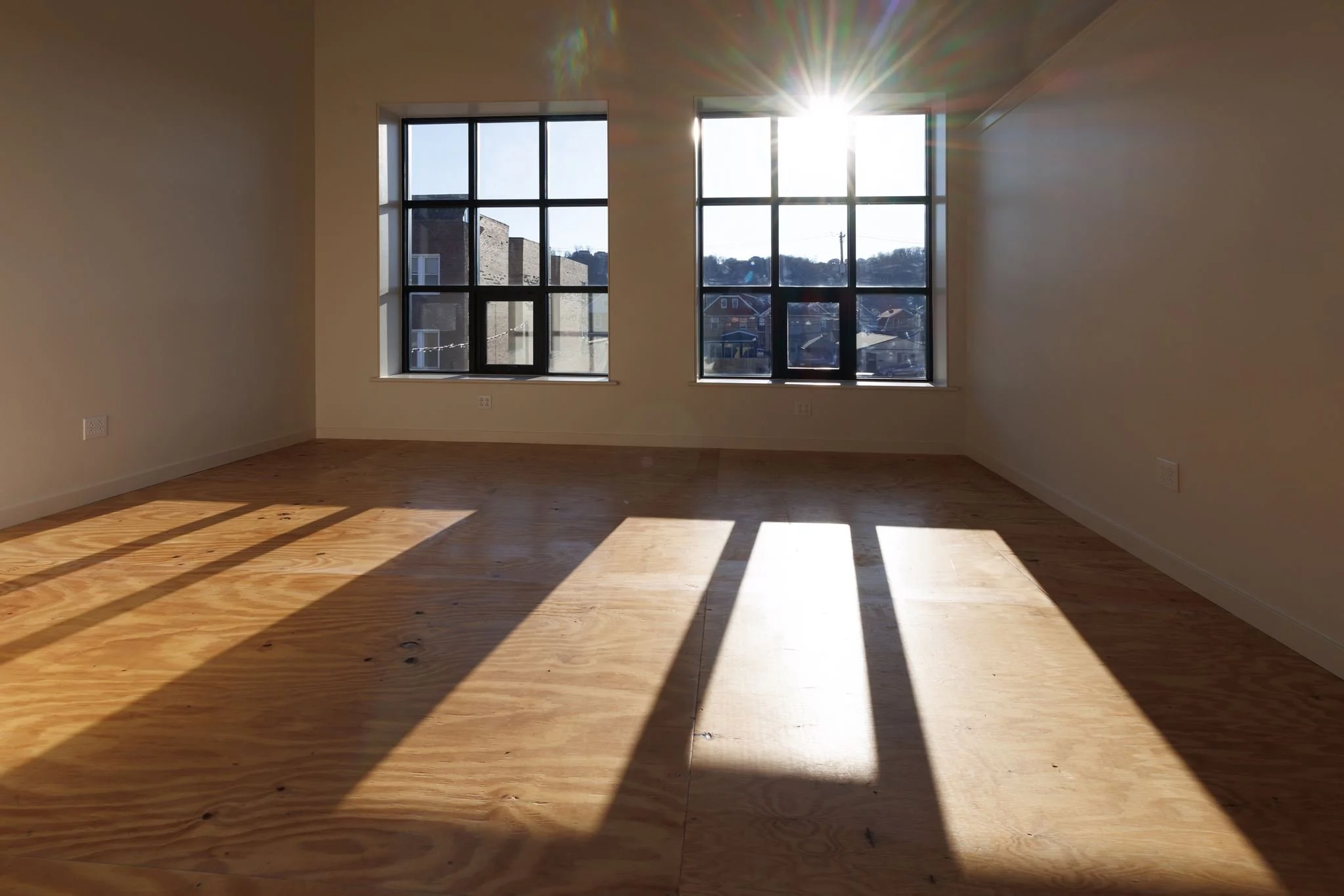 An example of a 215 square foot studio with two large windows available at PinDeck Studios & Gallery in Ambridge, PA.