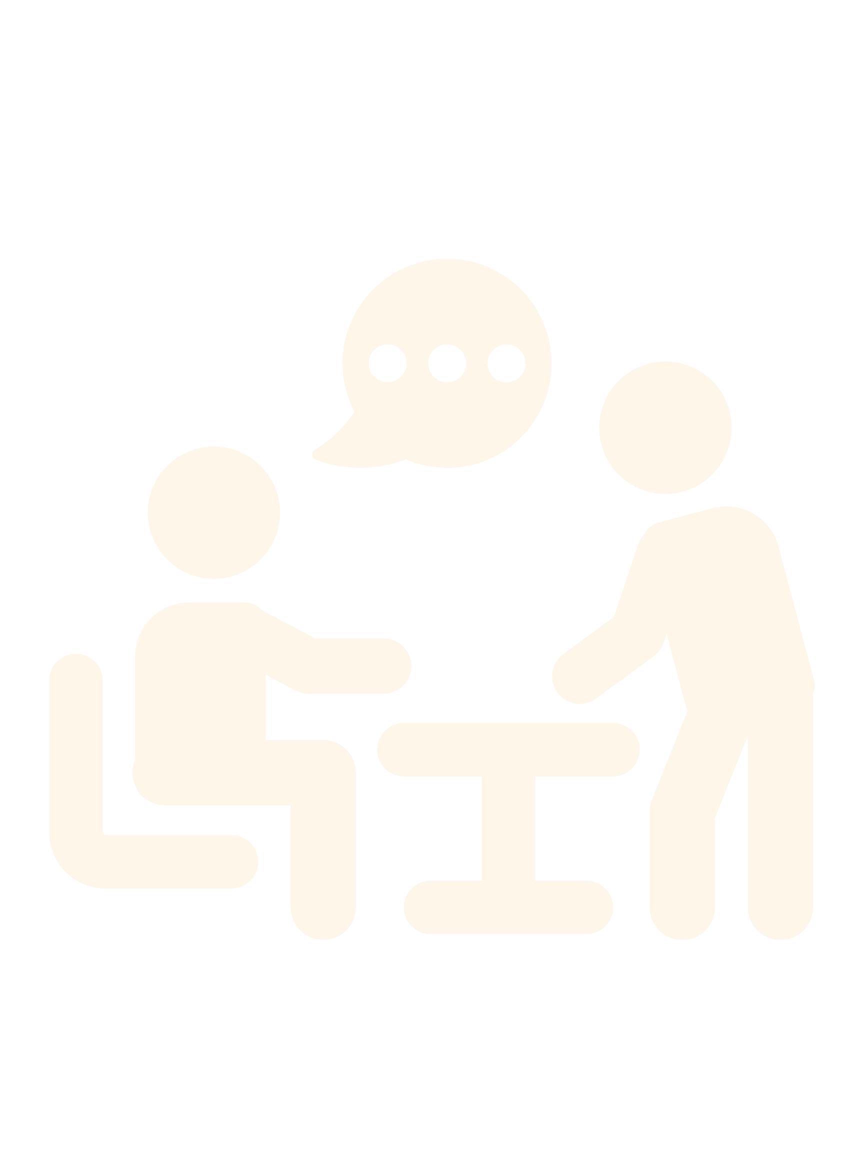 Icon of two people engaged in conversation at a table, with a speech bubble containing three dots above.