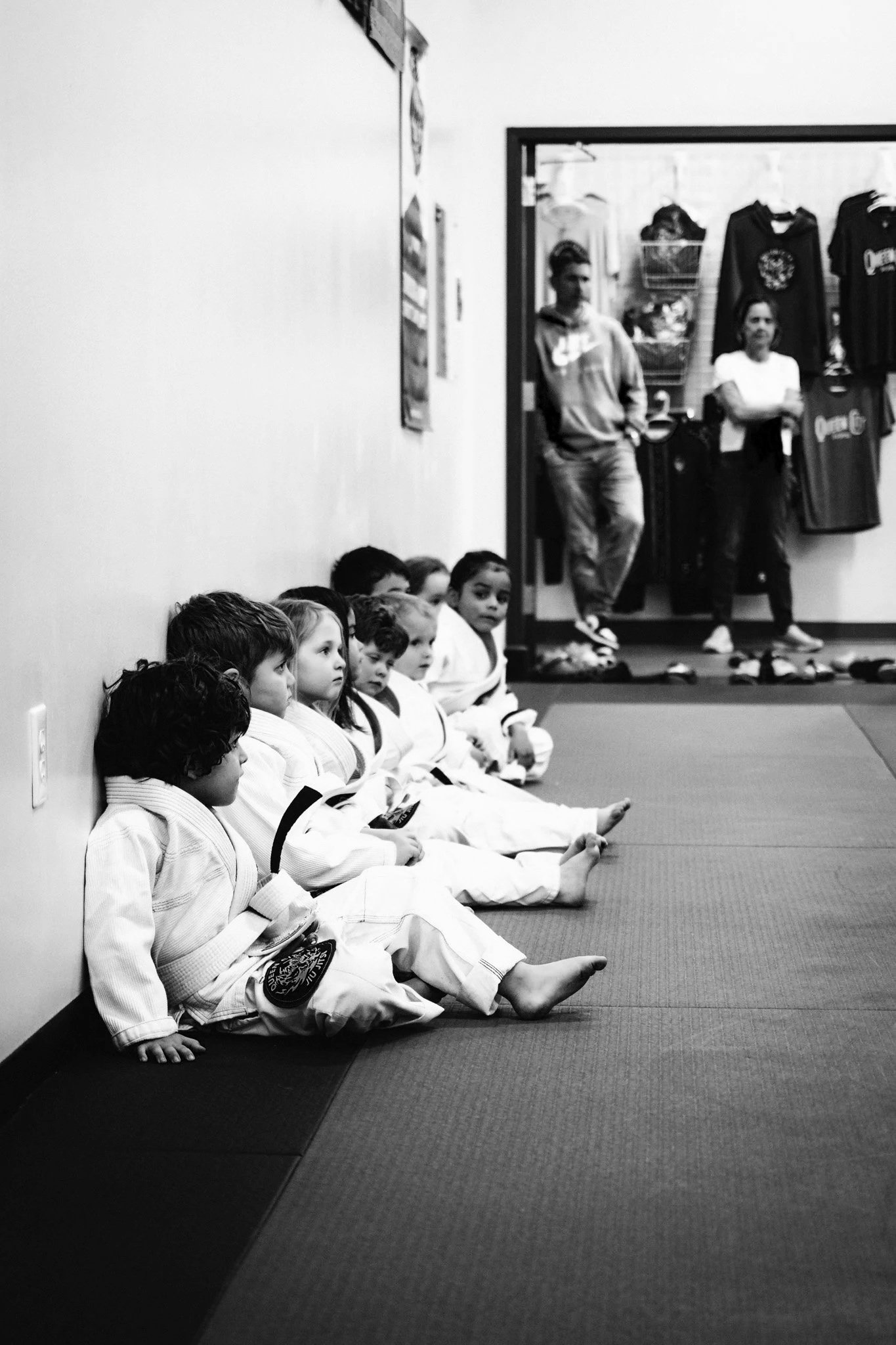 Toddler learning beginner jiu jitsu moves at Queen City Jiu Jitsu in Fort Mill, SC