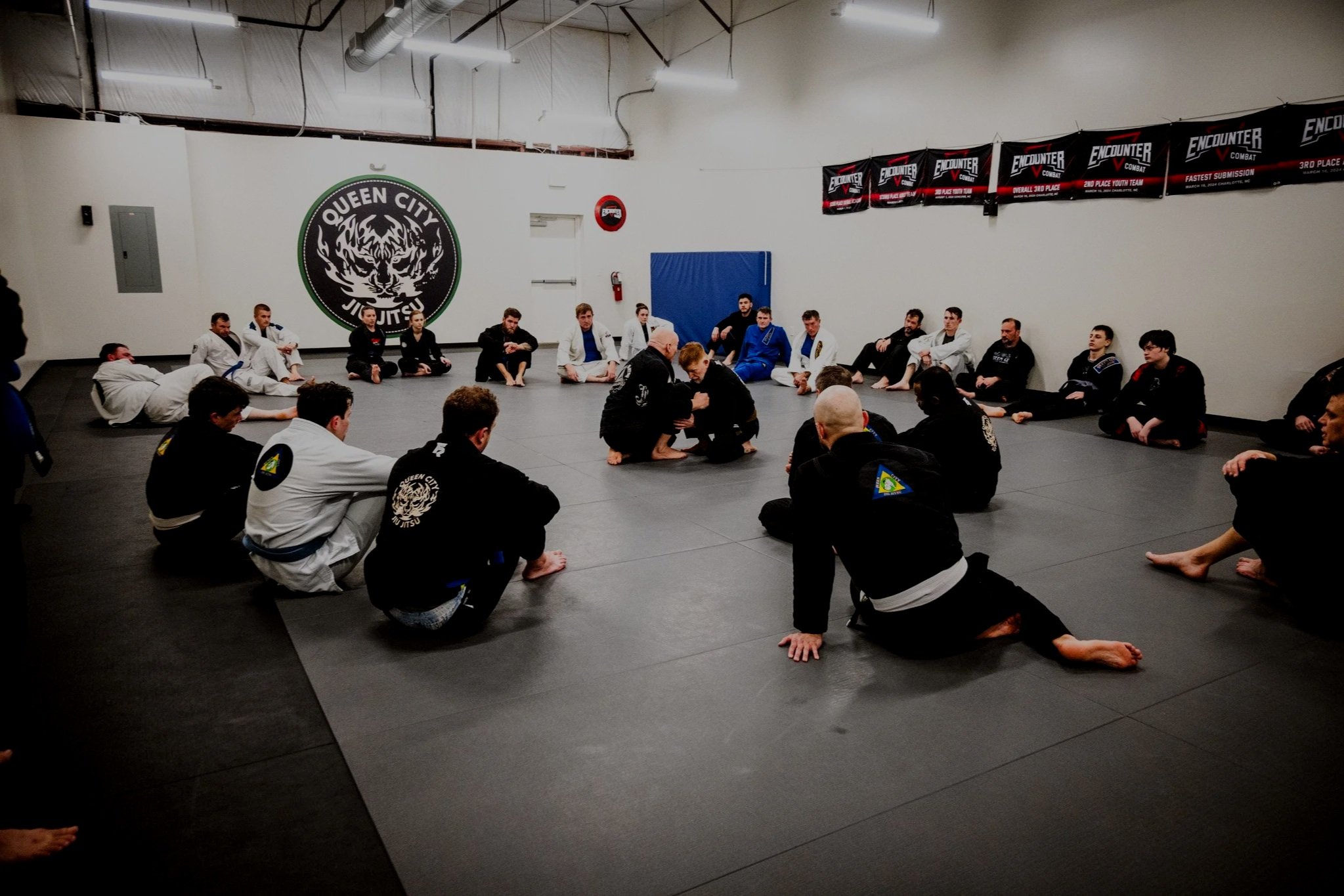 Adult Brazilian jiu jitsu class training at Queen City Jiu Jitsu in Fort Mill, SC