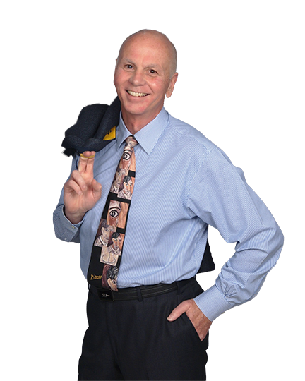 Phil Wilton, strategist and author, smiling warmly in a casual pose with a jacket over his shoulder.