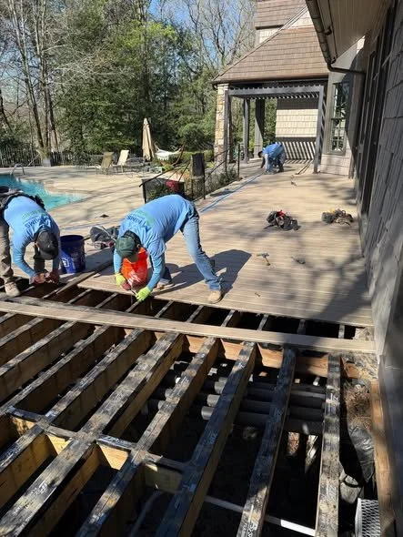 Mims Construction crew demoing old existing deck and porch structure for Allred family remodel in Chattanooga TN