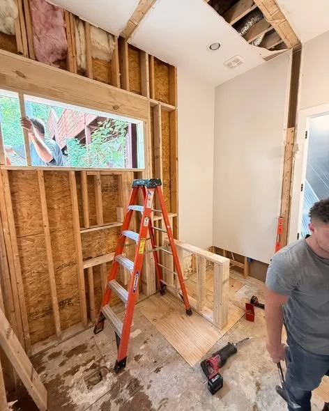 Mims Construction crew performing bathroom demolition and electrical rerouting in North Chattanooga TN home