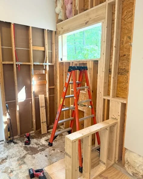 Mims Construction crew performing bathroom demolition and electrical rerouting in North Chattanooga TN home